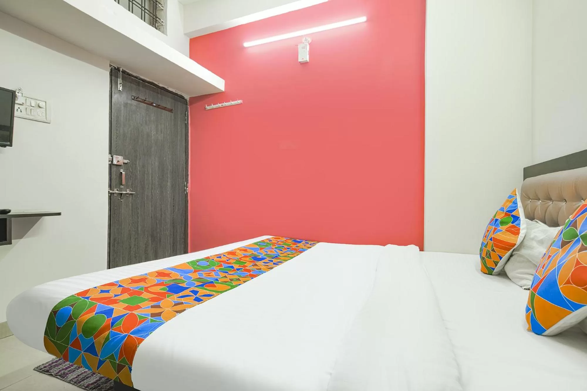 Bed in FabExpress Royal Palace Inn