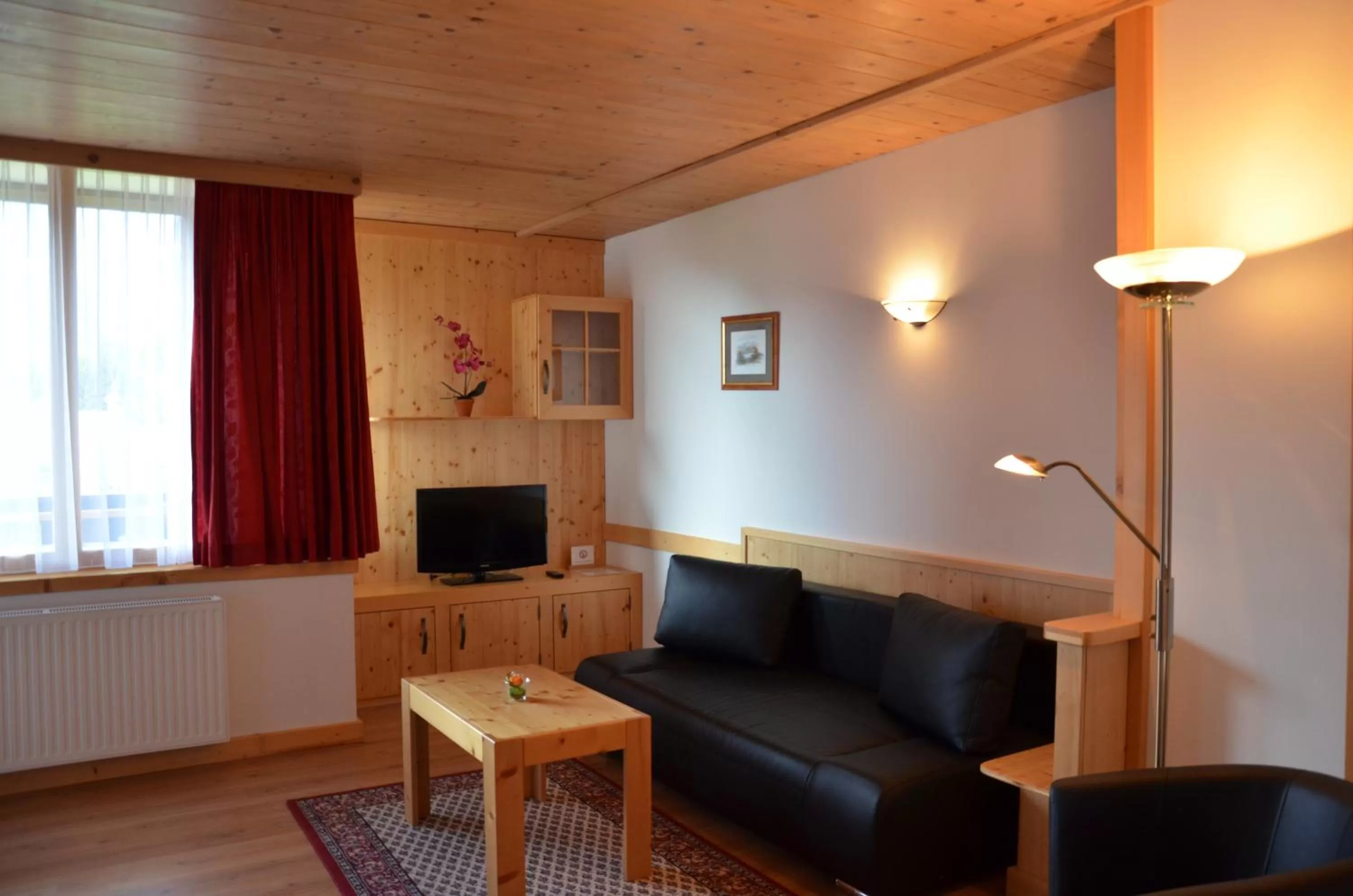 Communal lounge/ TV room in Pension zum Schreiner