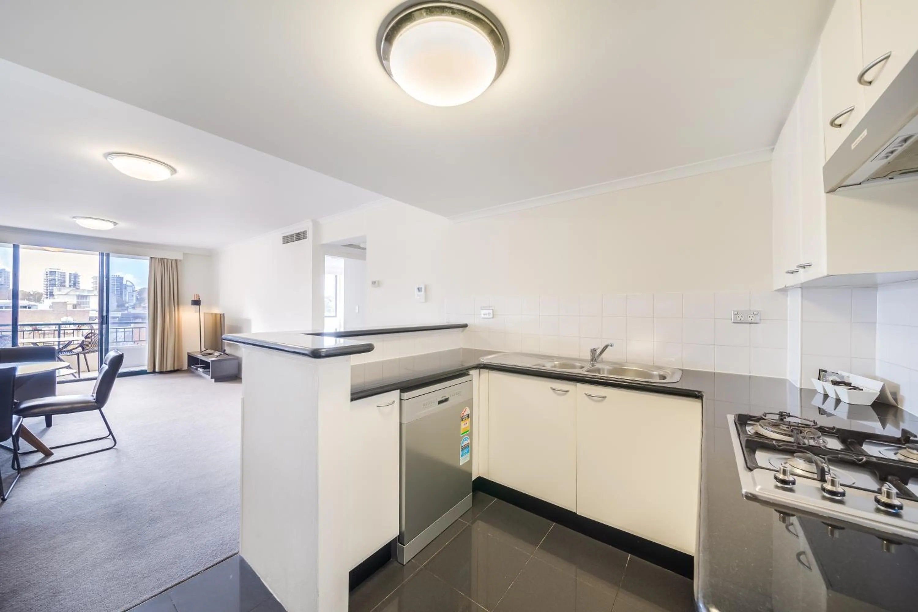 Kitchen or kitchenette in Oaks Sydney Castlereagh Suites