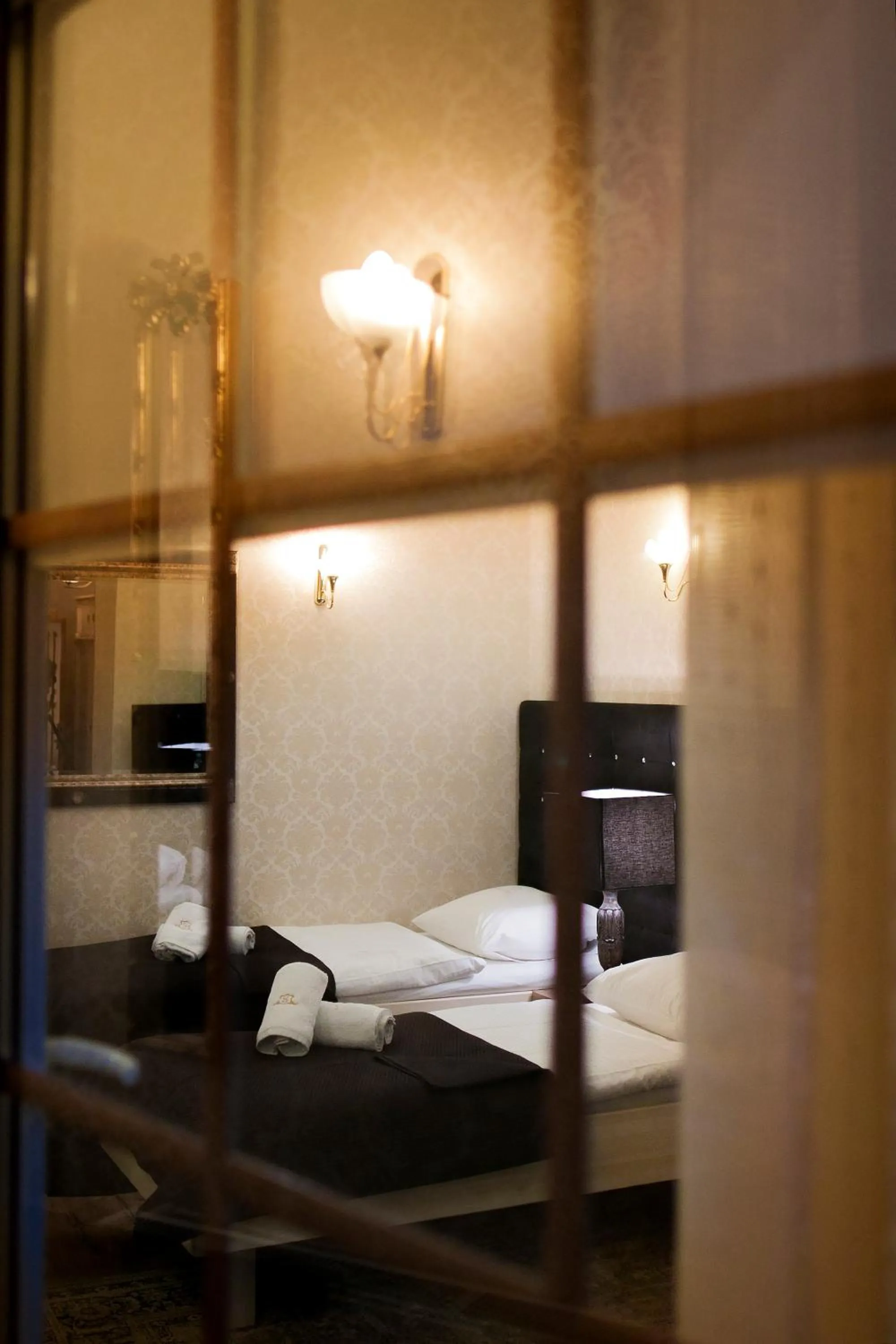 Bed in Aparthotel Oberża