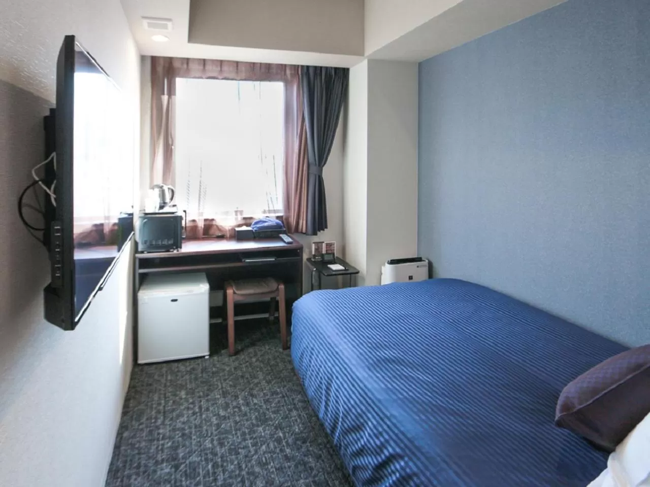 Bed in HOTEL LiVEMAX Tokyo Bakurocho