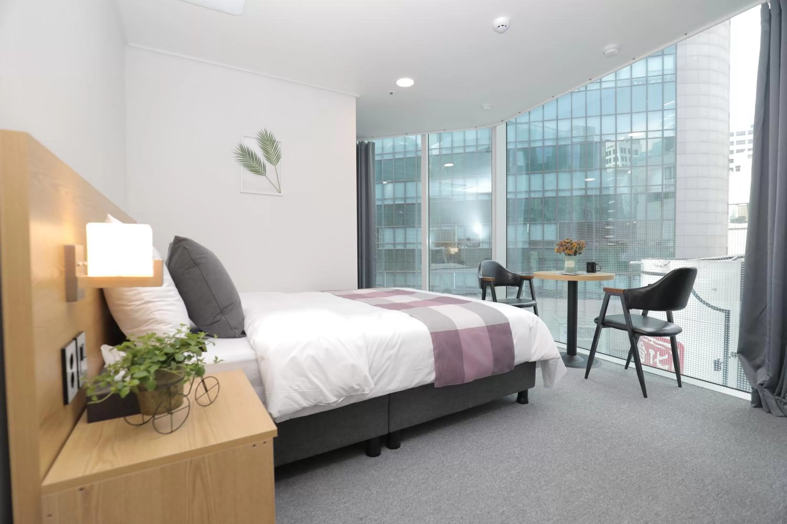 Living room, Bed in Line Hotel Myeongdong