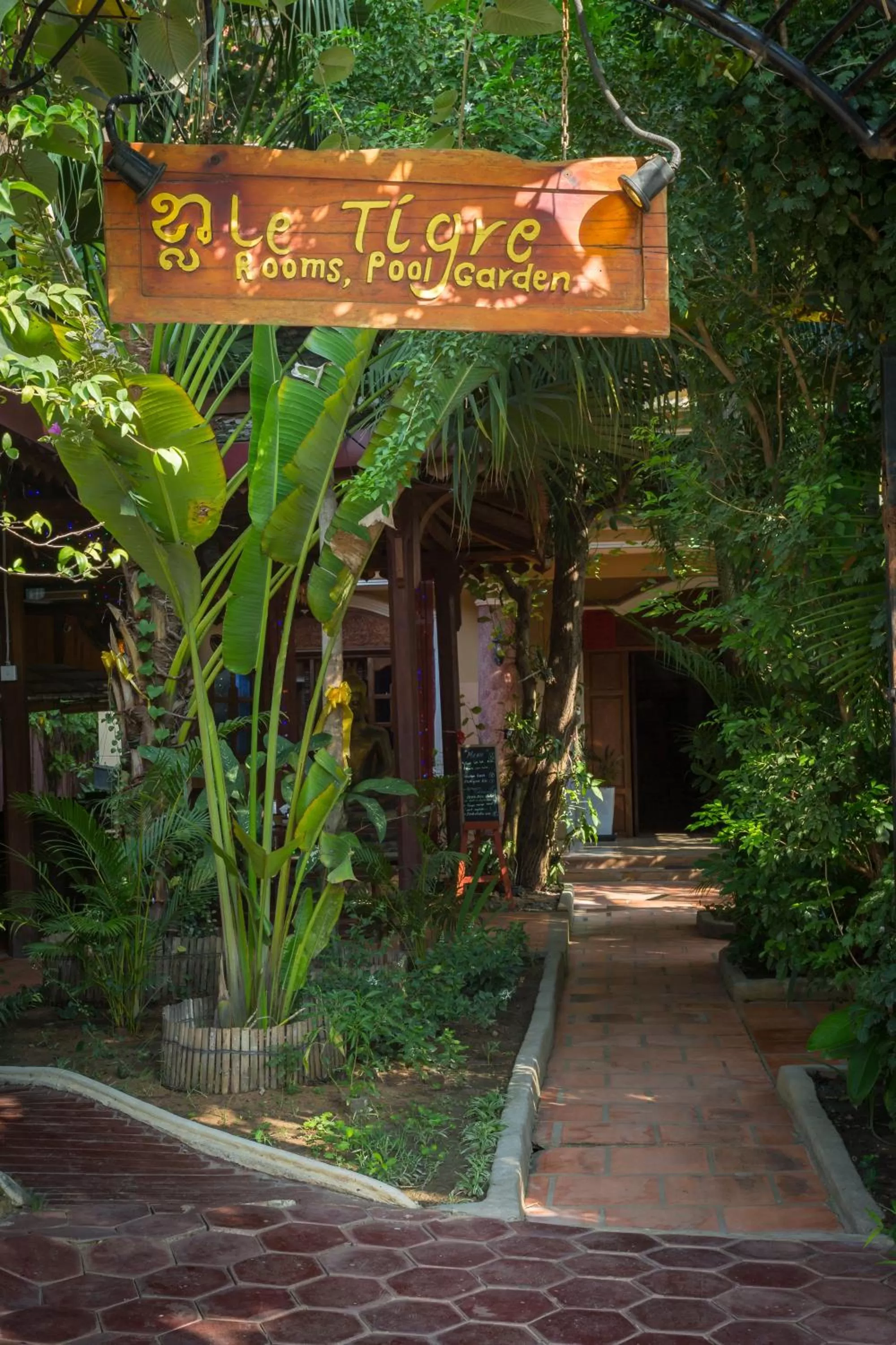 Property logo or sign in Le Tigre Villa