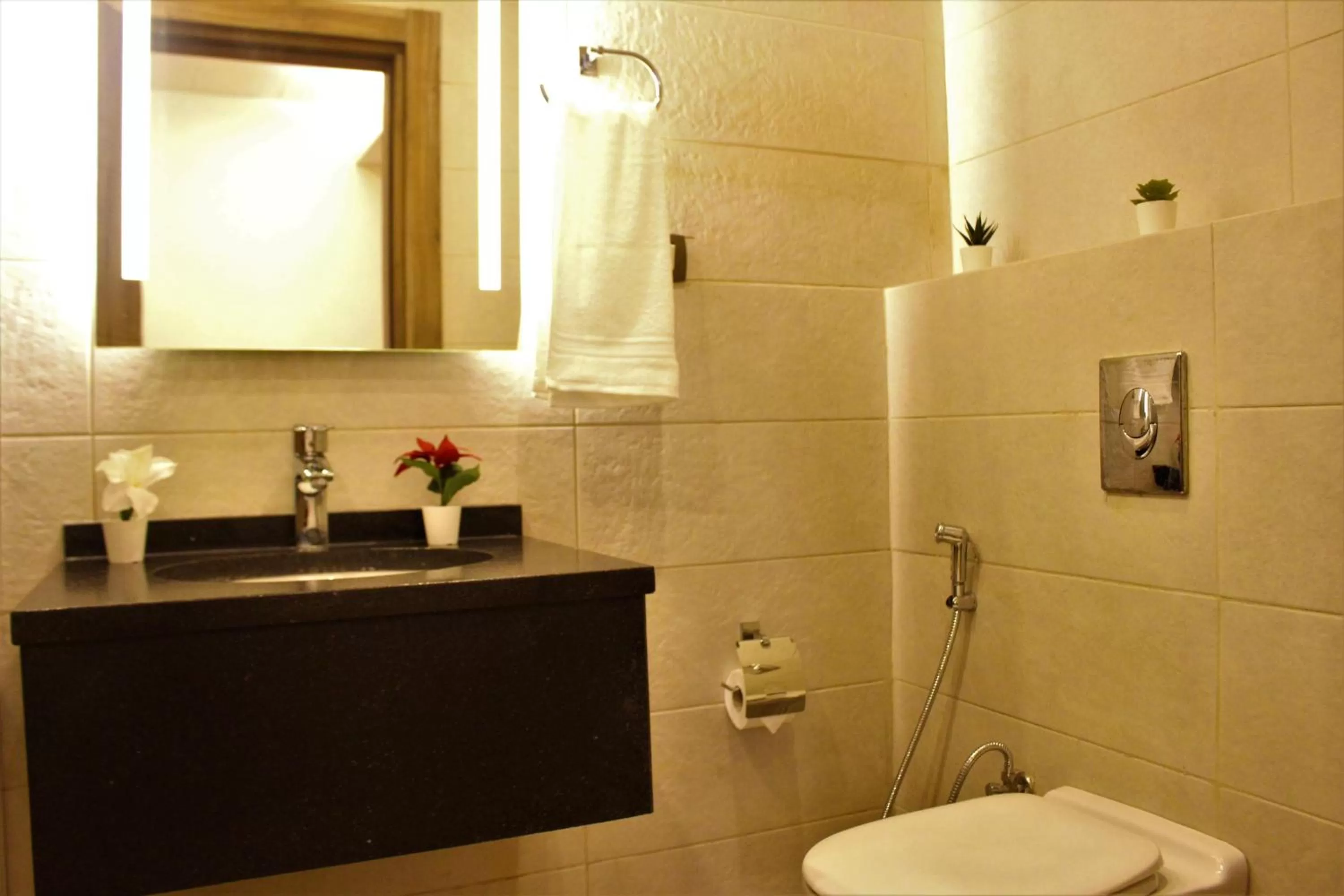 Bathroom in New MerryLand Hotel