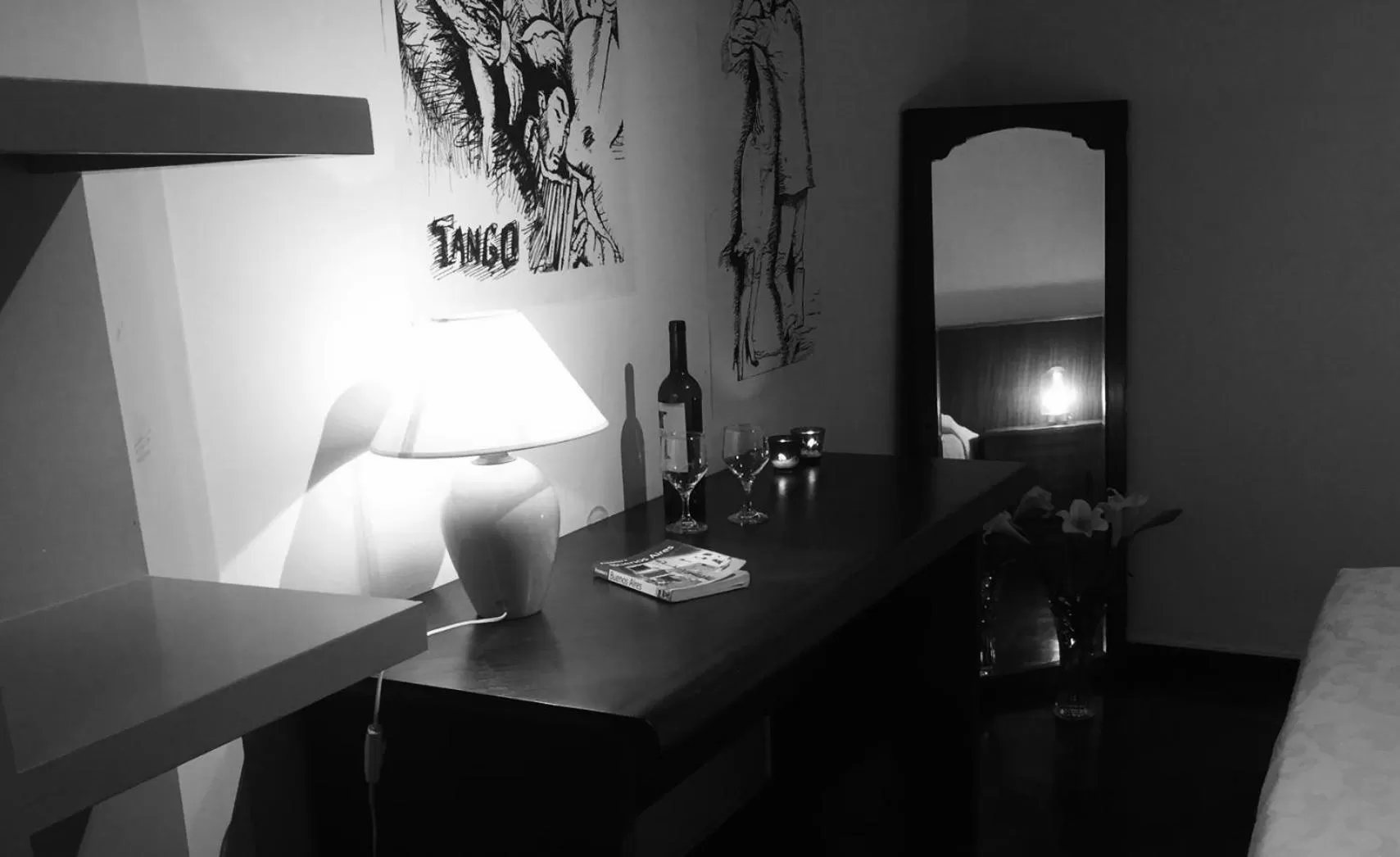 Photo of the whole room, TV/Entertainment Center in Lina's Tango Guesthouse