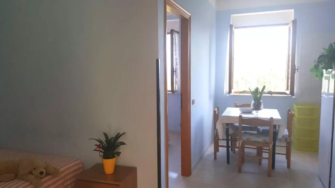 Dining area in Jolly Residence Dining area in Jolly Residence