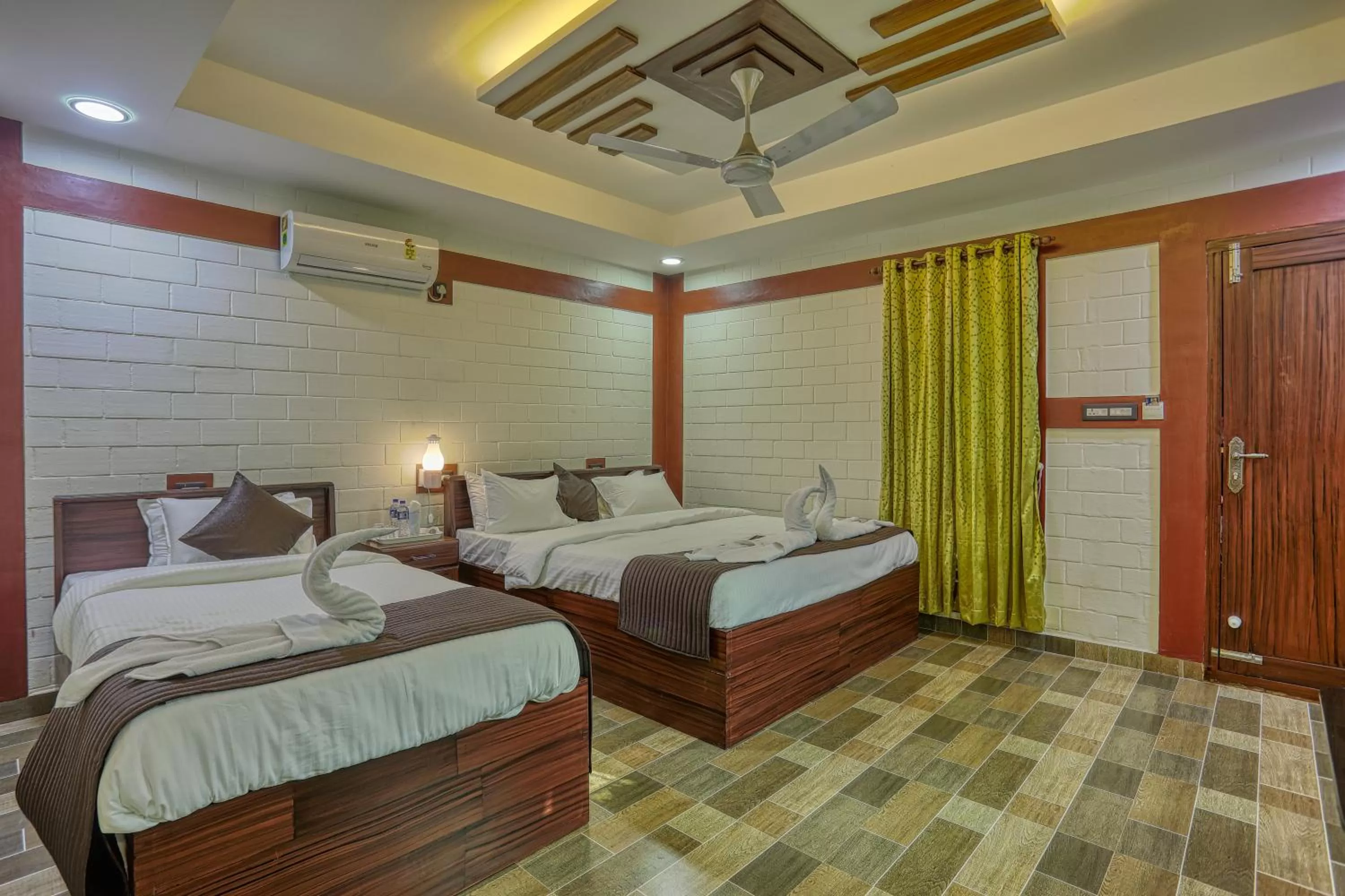 Bed in LEISURE VALLEY BEACH RESORT