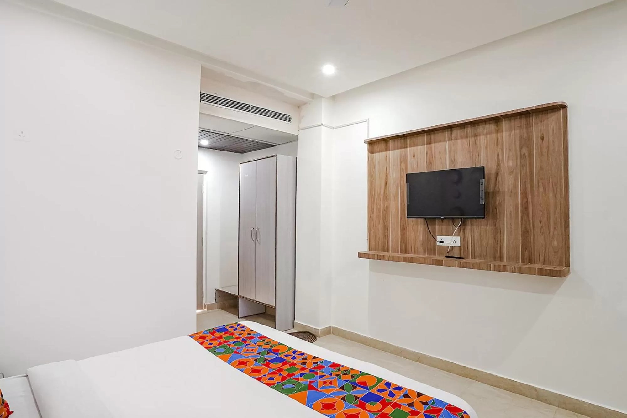 Bed in FabHotel Siddhi