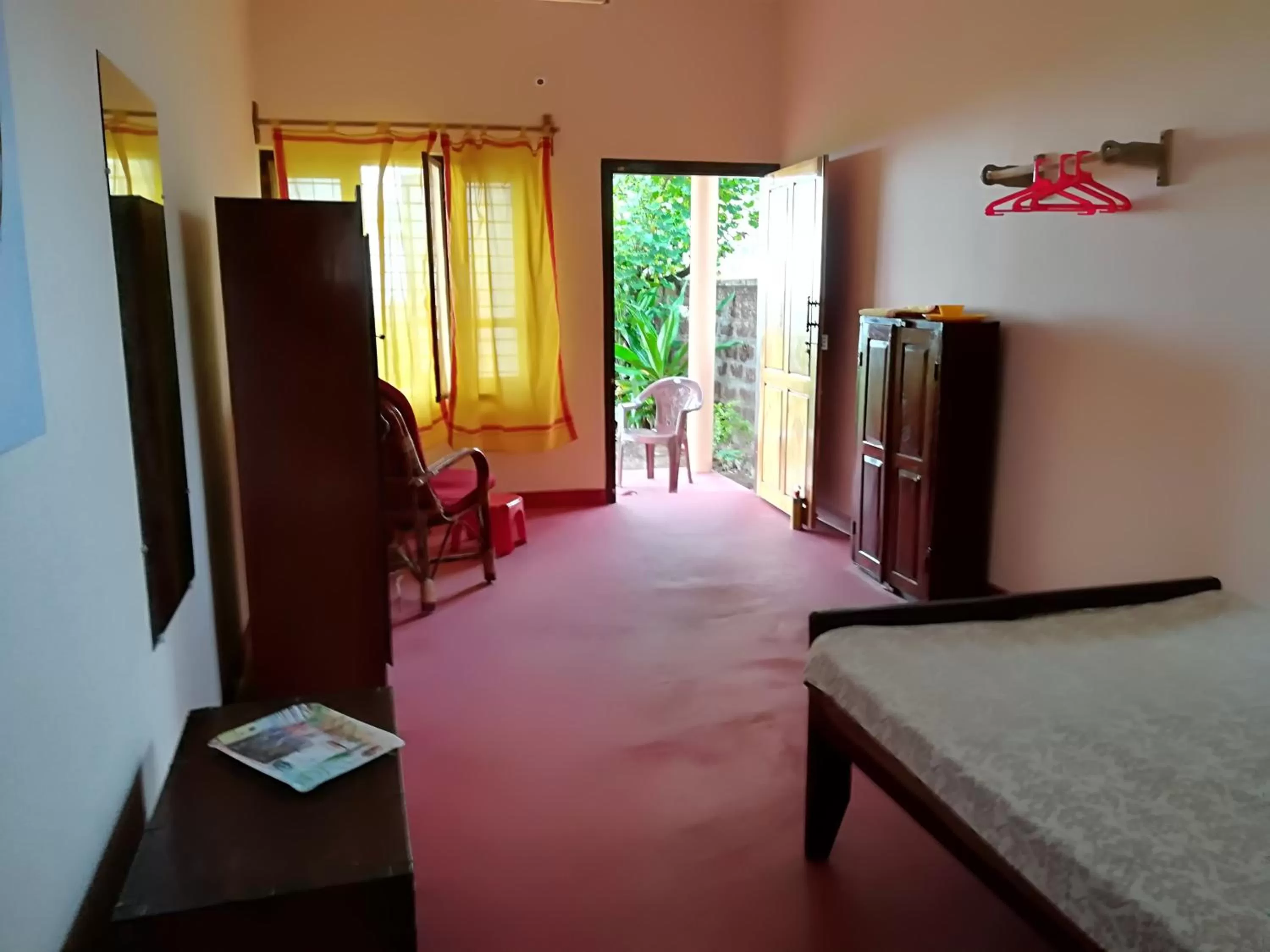 Photo of the whole room, TV/Entertainment Center in Sukriti beach Resort