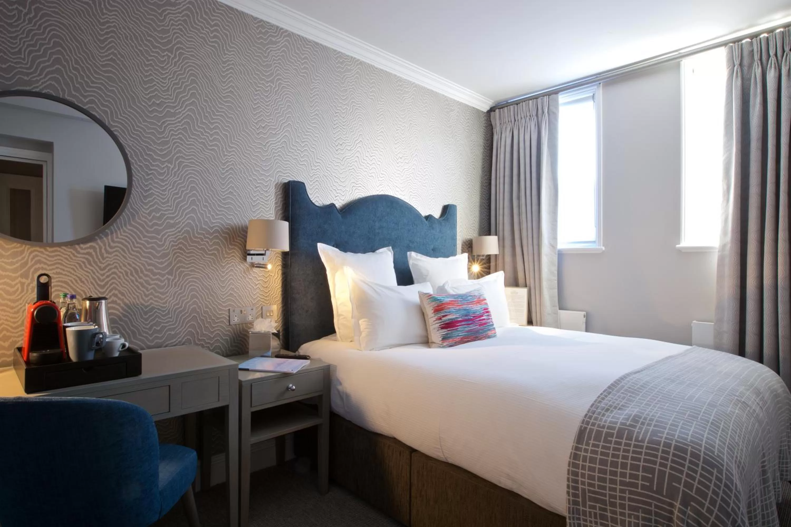 Bed in 54 Queen's Gate Hotel