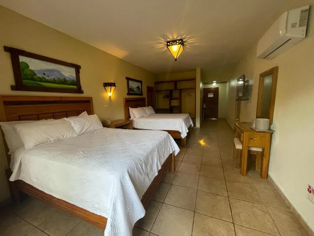 Bed in Hotel Gran Jimenoa