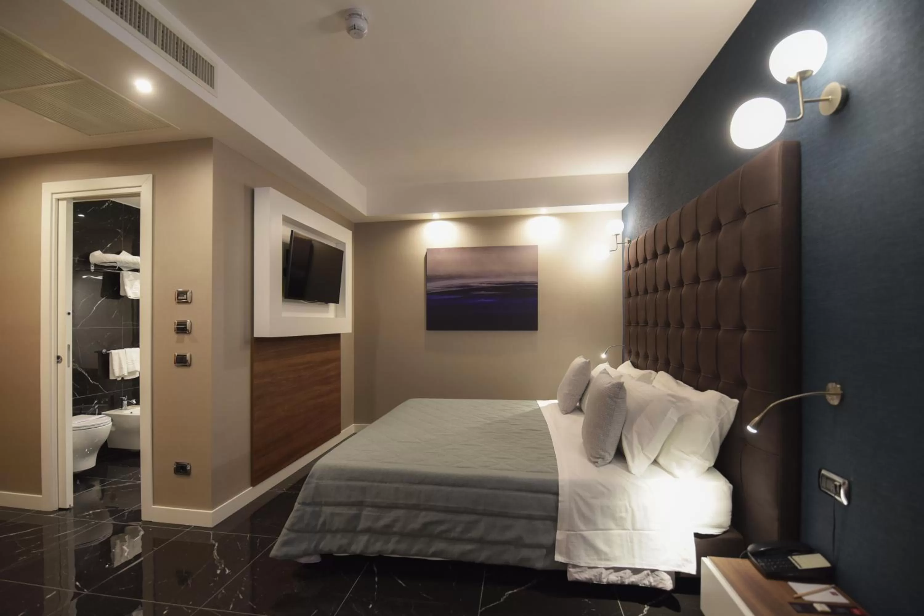 Bathroom, Bed in Magri's Hotel