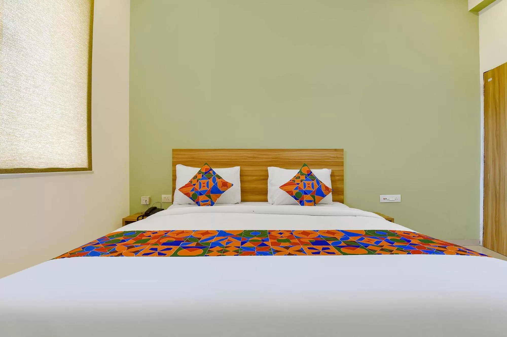 Bed in FabHotel Prime Oxus