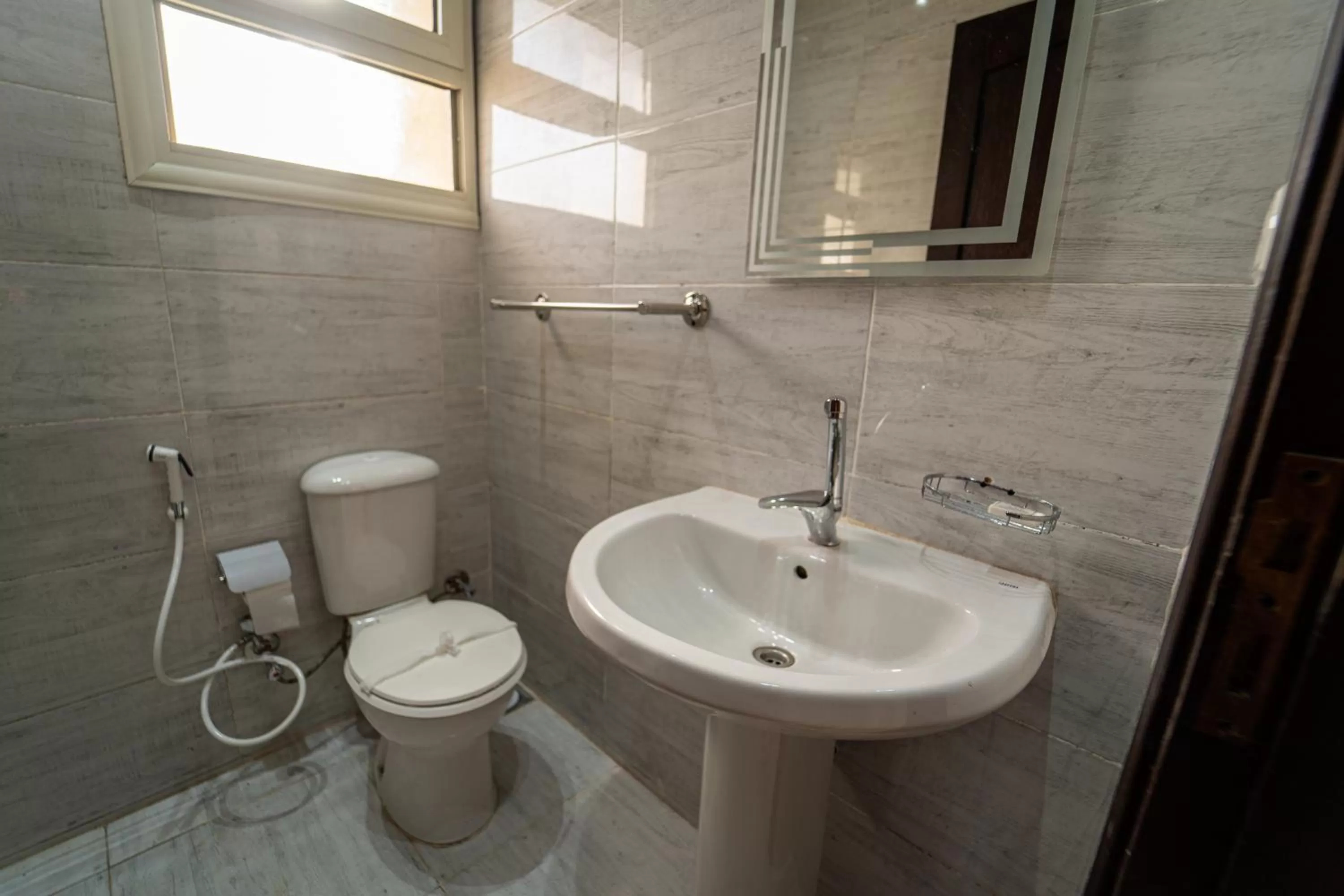 Bathroom in Gardenia Inn Hotel