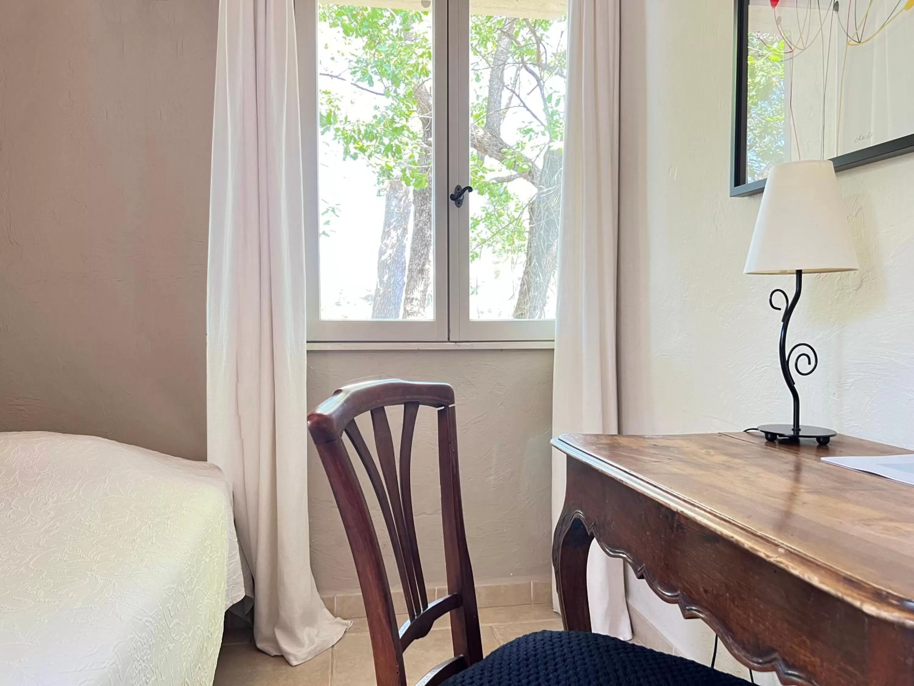 Decorative detail, Bed in Hotel Les Messugues