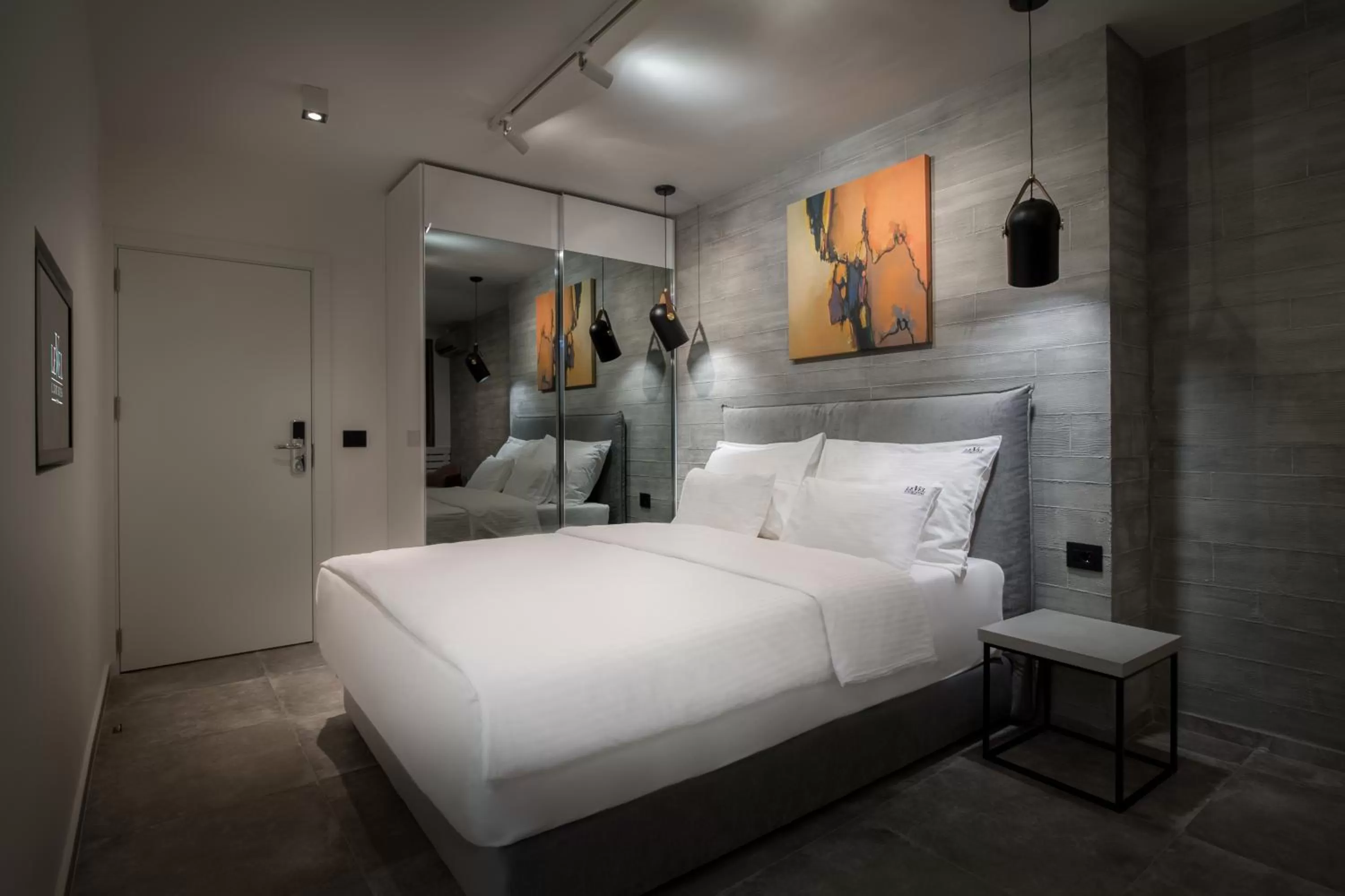 Bedroom, Bed in Level Luxury Suites