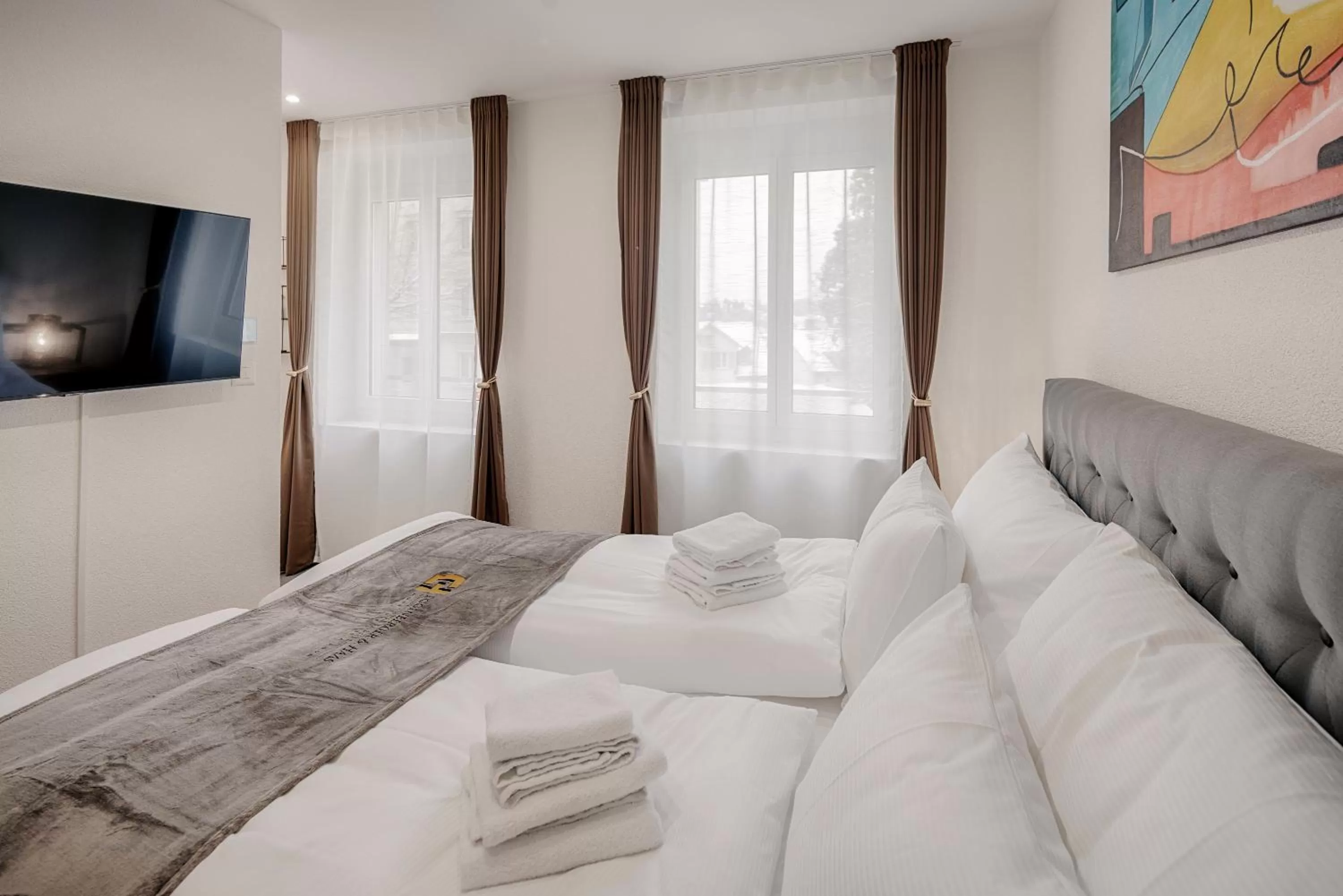 Bed in VISIMO Apartments St Georgen-Strasse St Gallen - Design City Nature