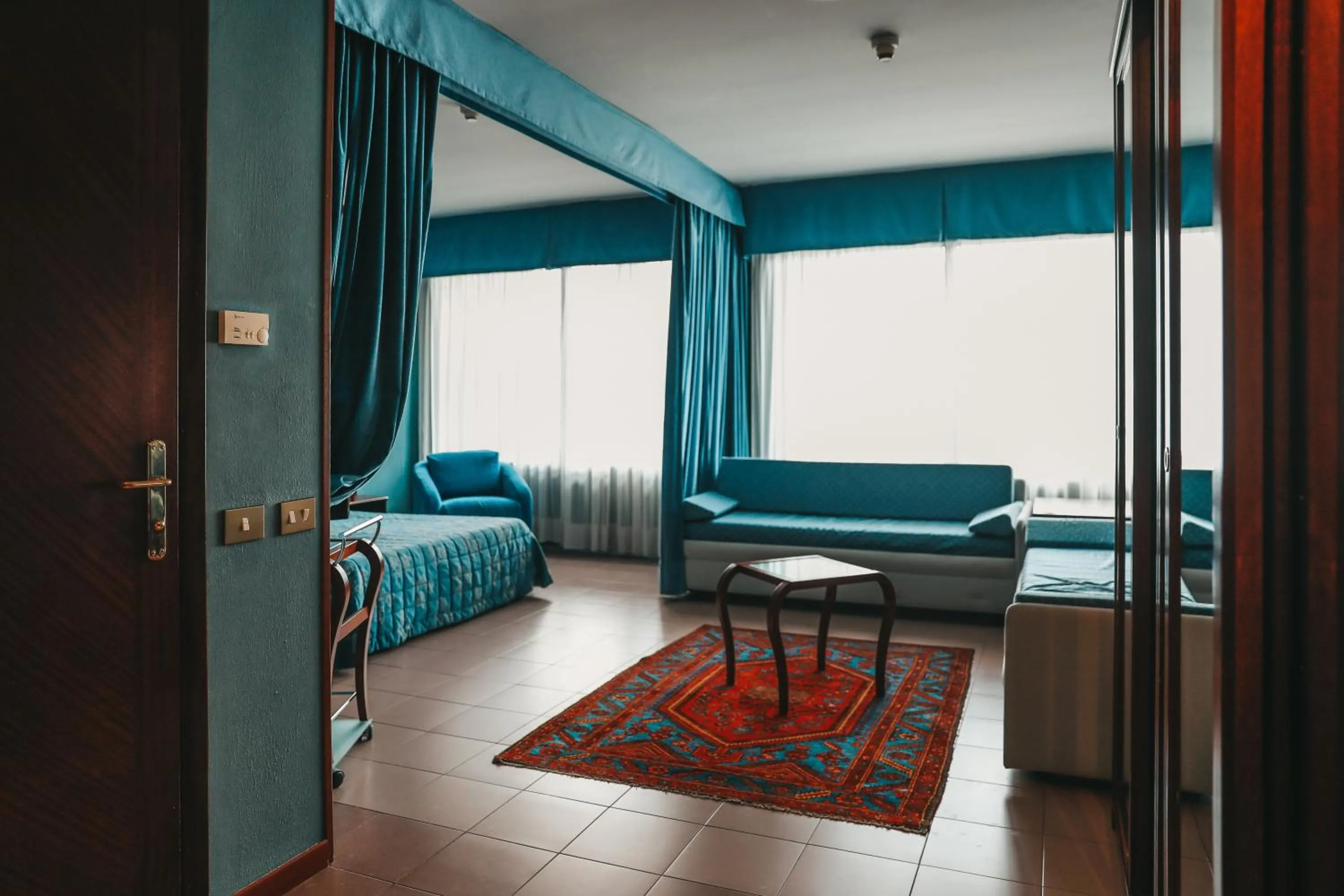 Bed in Hotel Dante Family Spa Resort