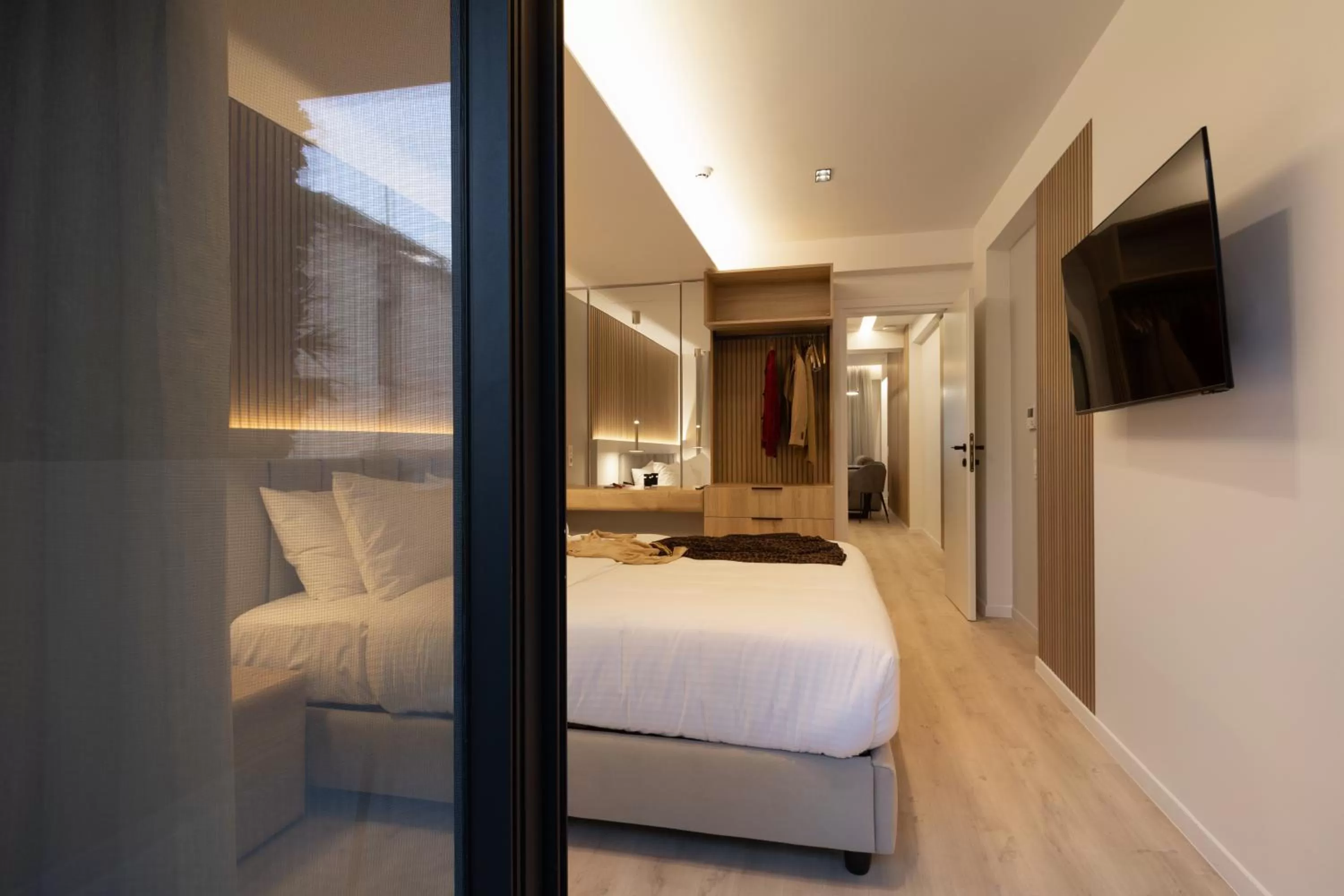 Bed in Incanto Boutique Suites - Neos Kosmos