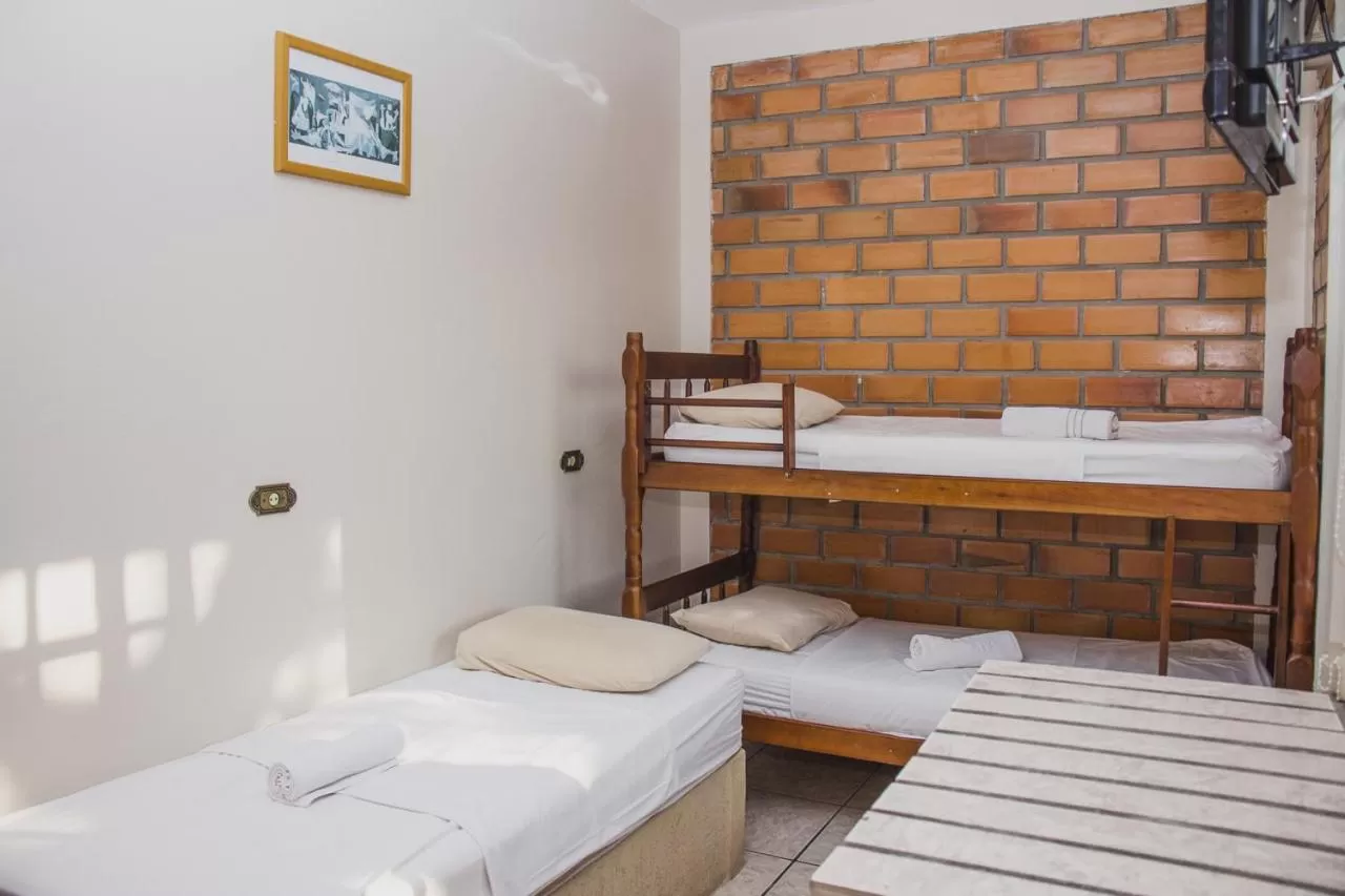 Bed in Pousada Marinamarela