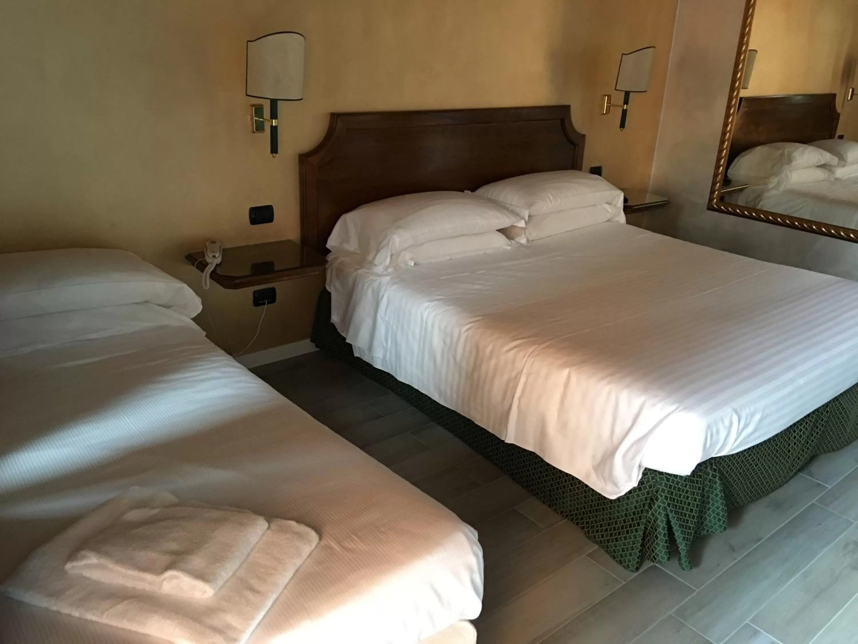 Bed in Hotel Don Carlo