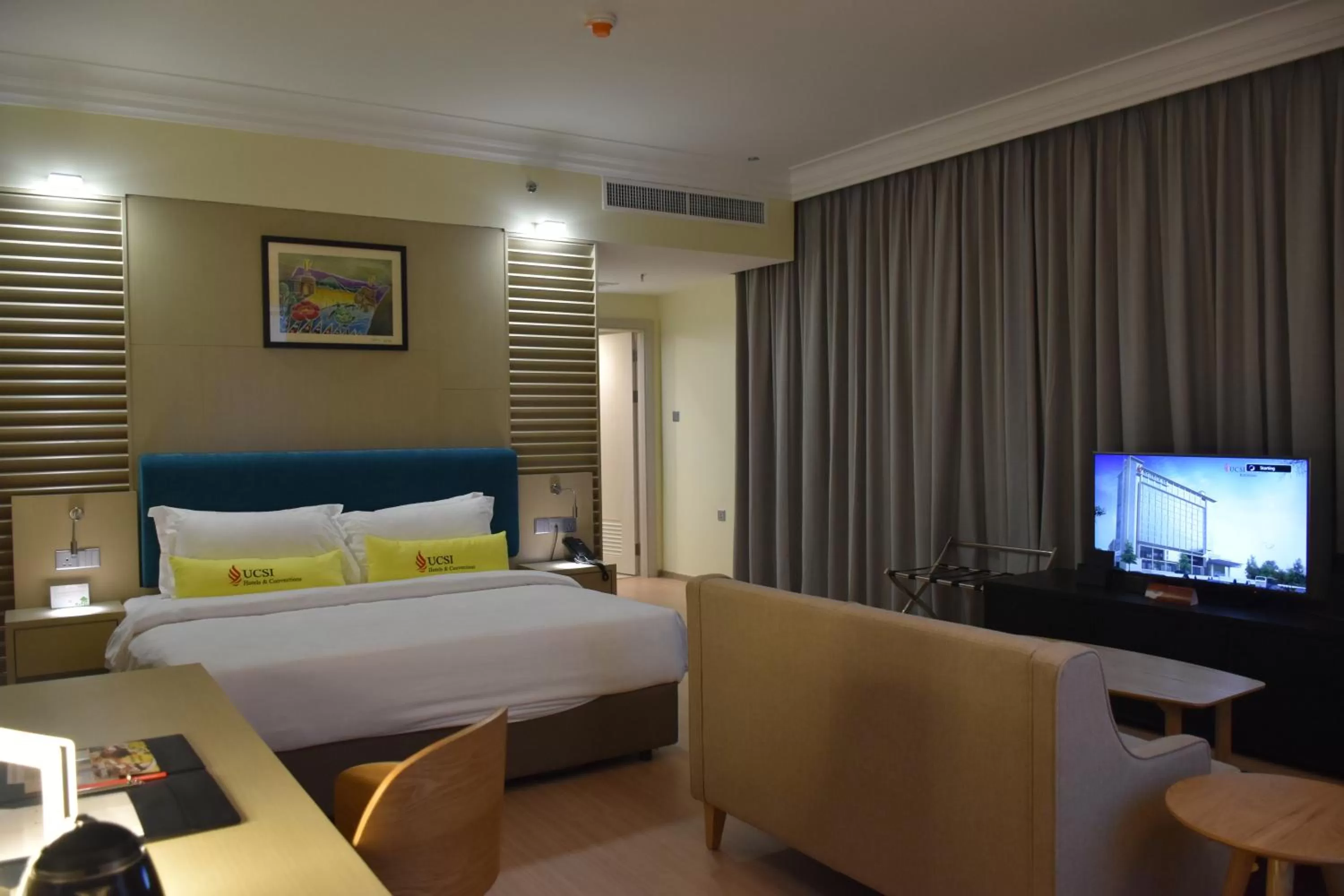 Living room, Bed in UCSI Hotel Kuching