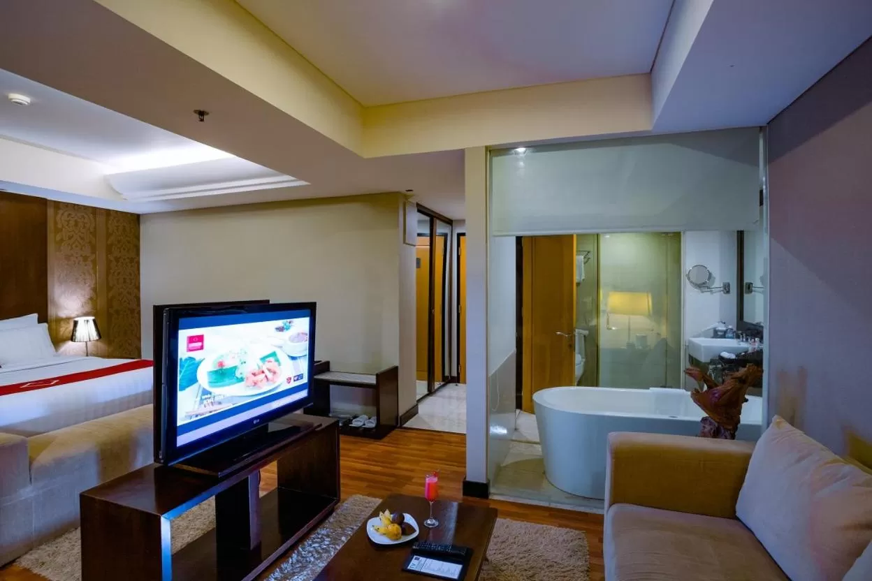 Bed in Emersia Hotel and Resort