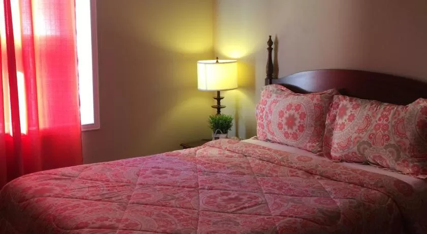 Bed in The Falls Family Lodge