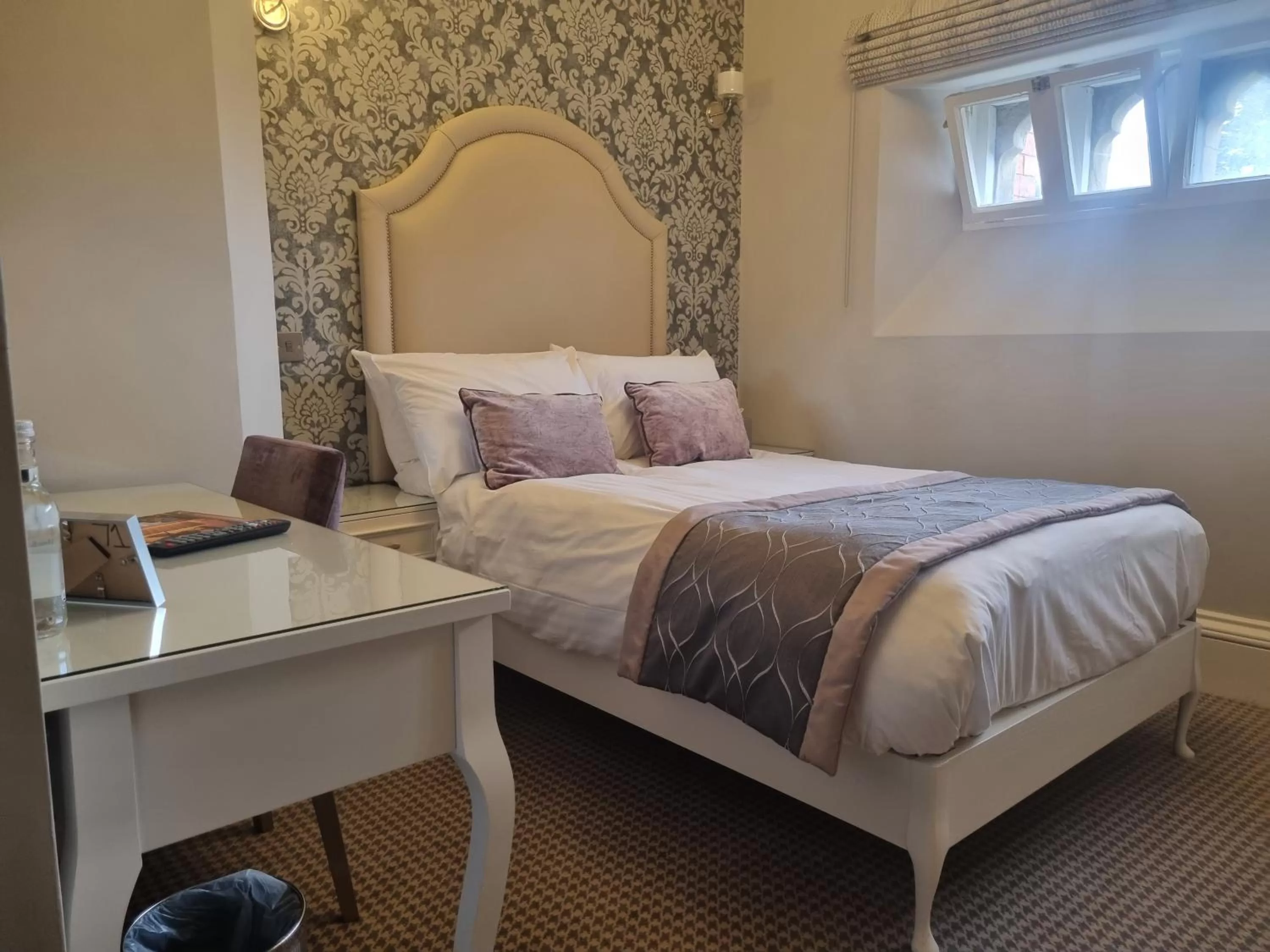 Bed in Wroxall Abbey Hotel