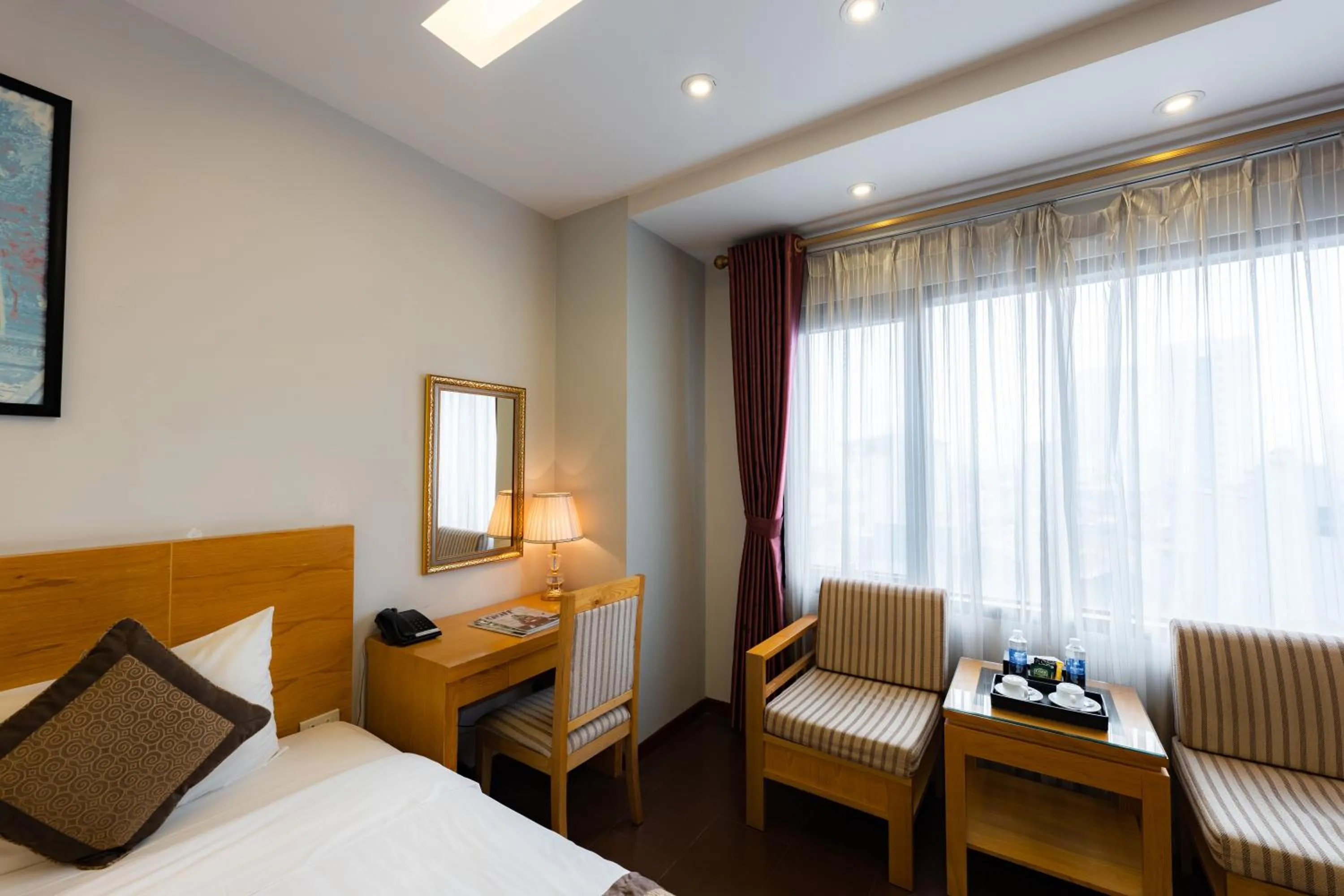 Bed in Riverside Hanoi Hotel