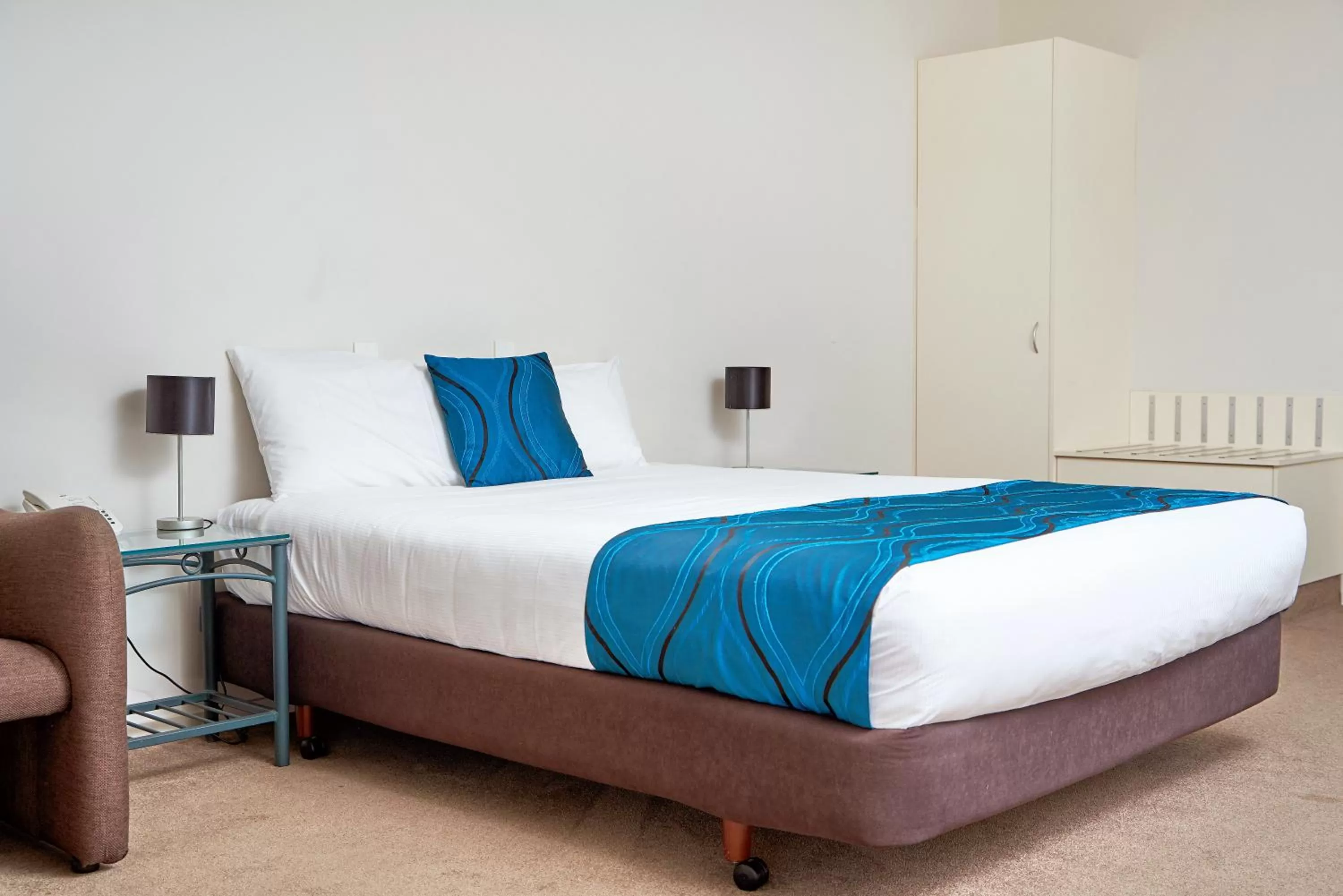 Bed in Barringtons Motor Lodge