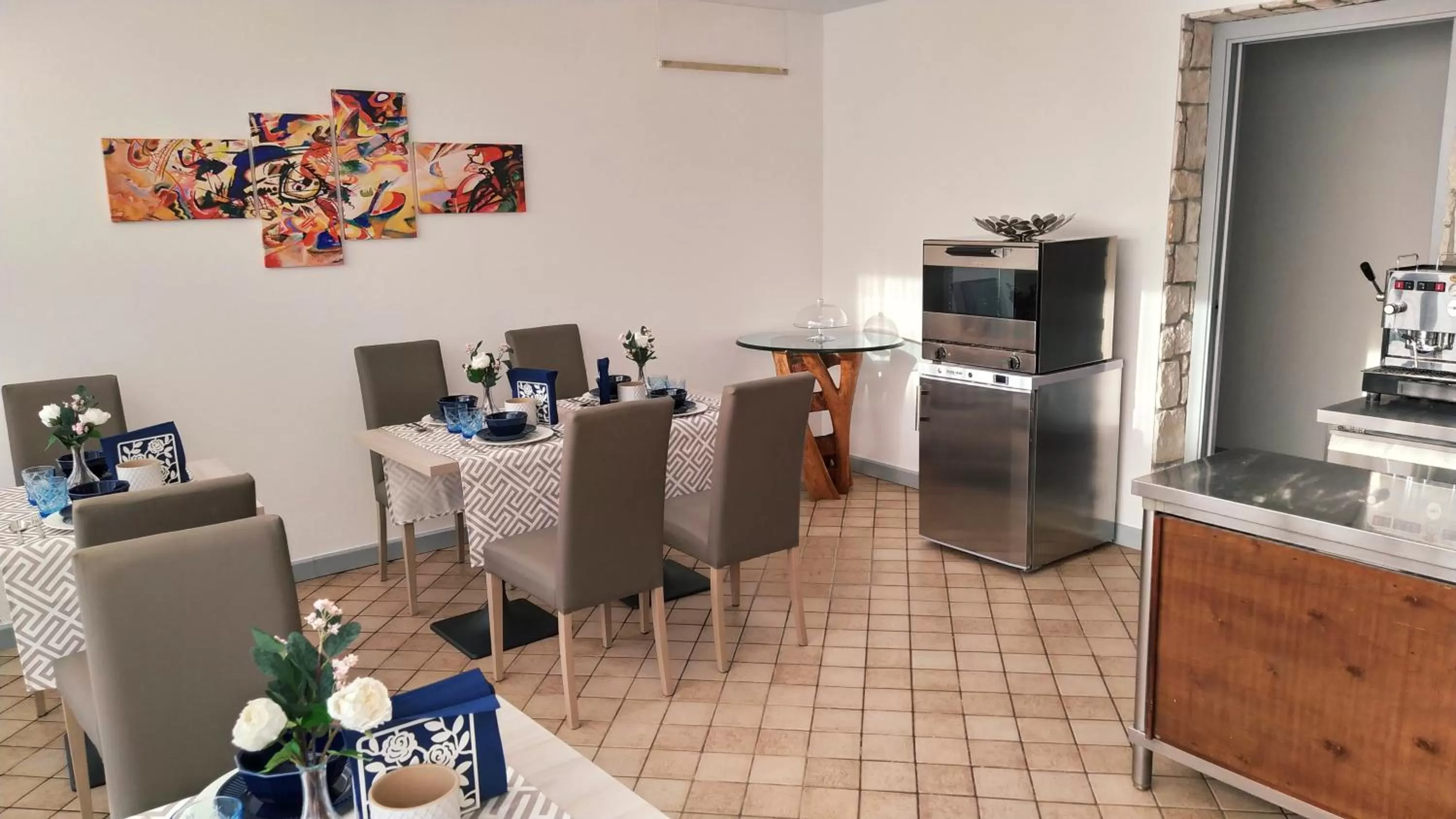 Communal lounge/ TV room in B&B La Stazione