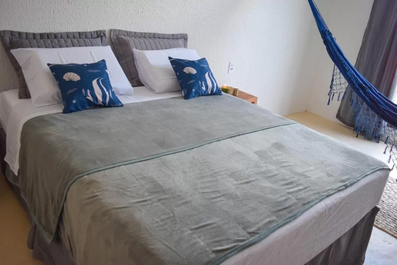 Bed in Pousada Village Sonhos Camocim