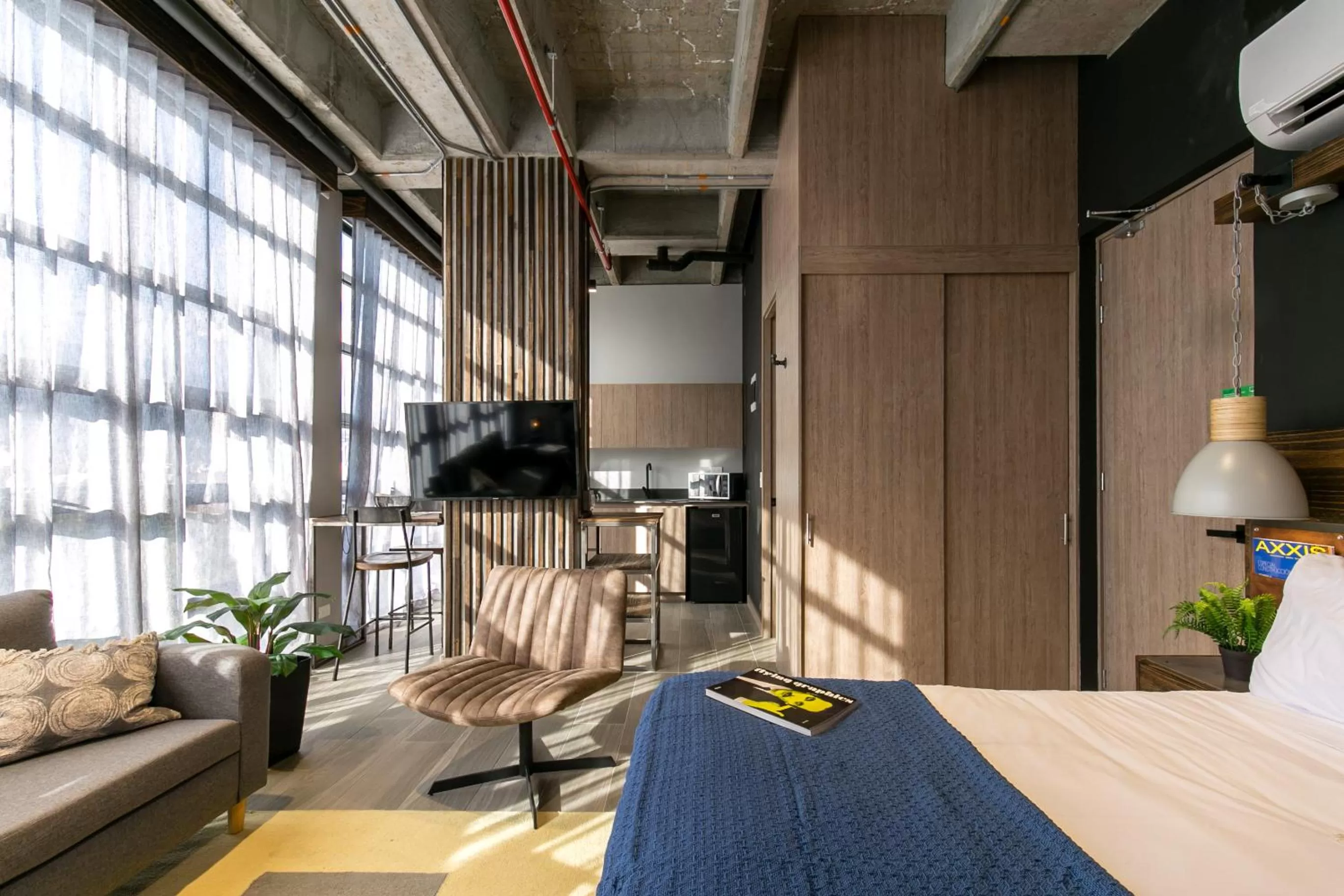 Bed in Factory Lofts Hotel