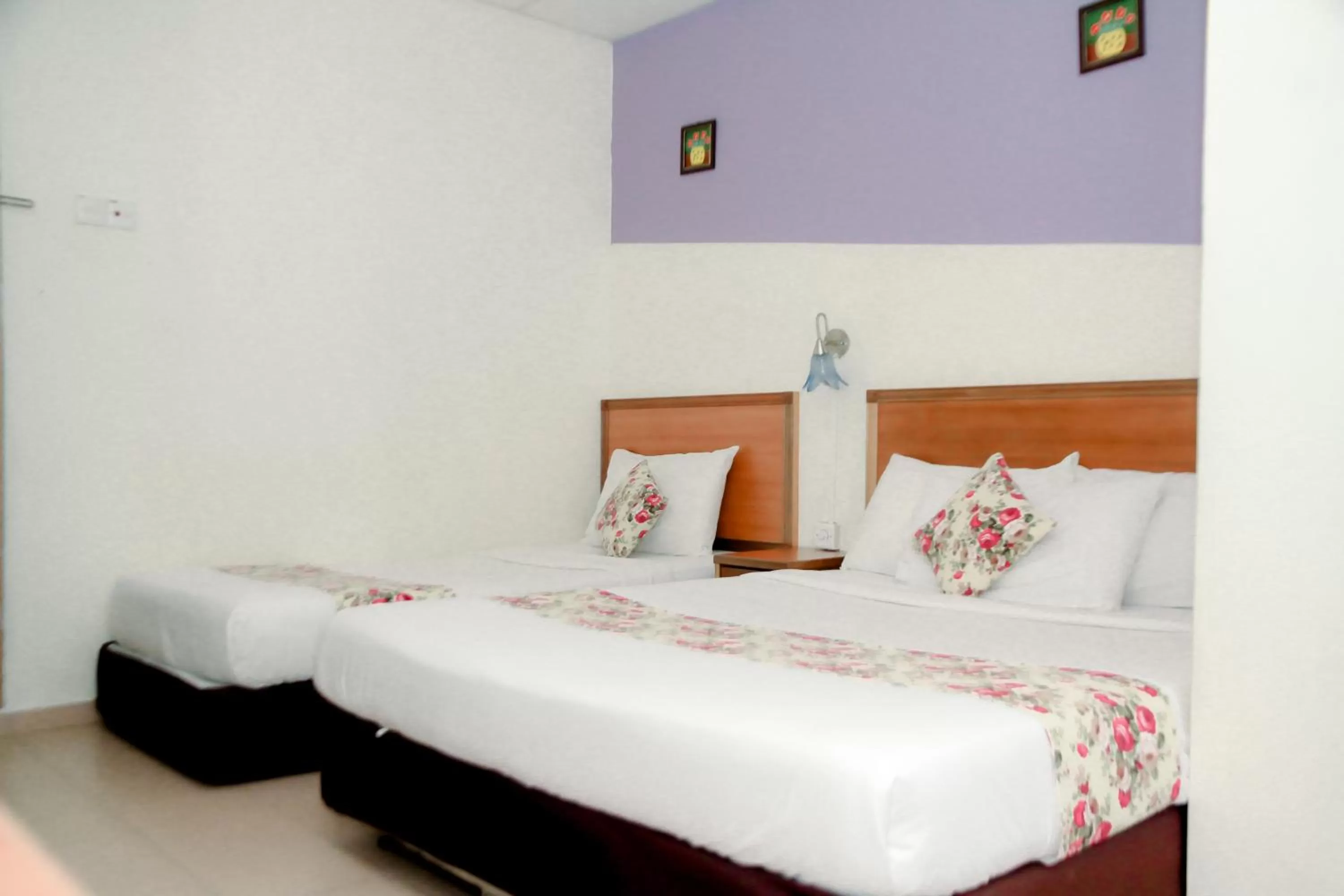 Bed in HOTEL D VIEW MERSING