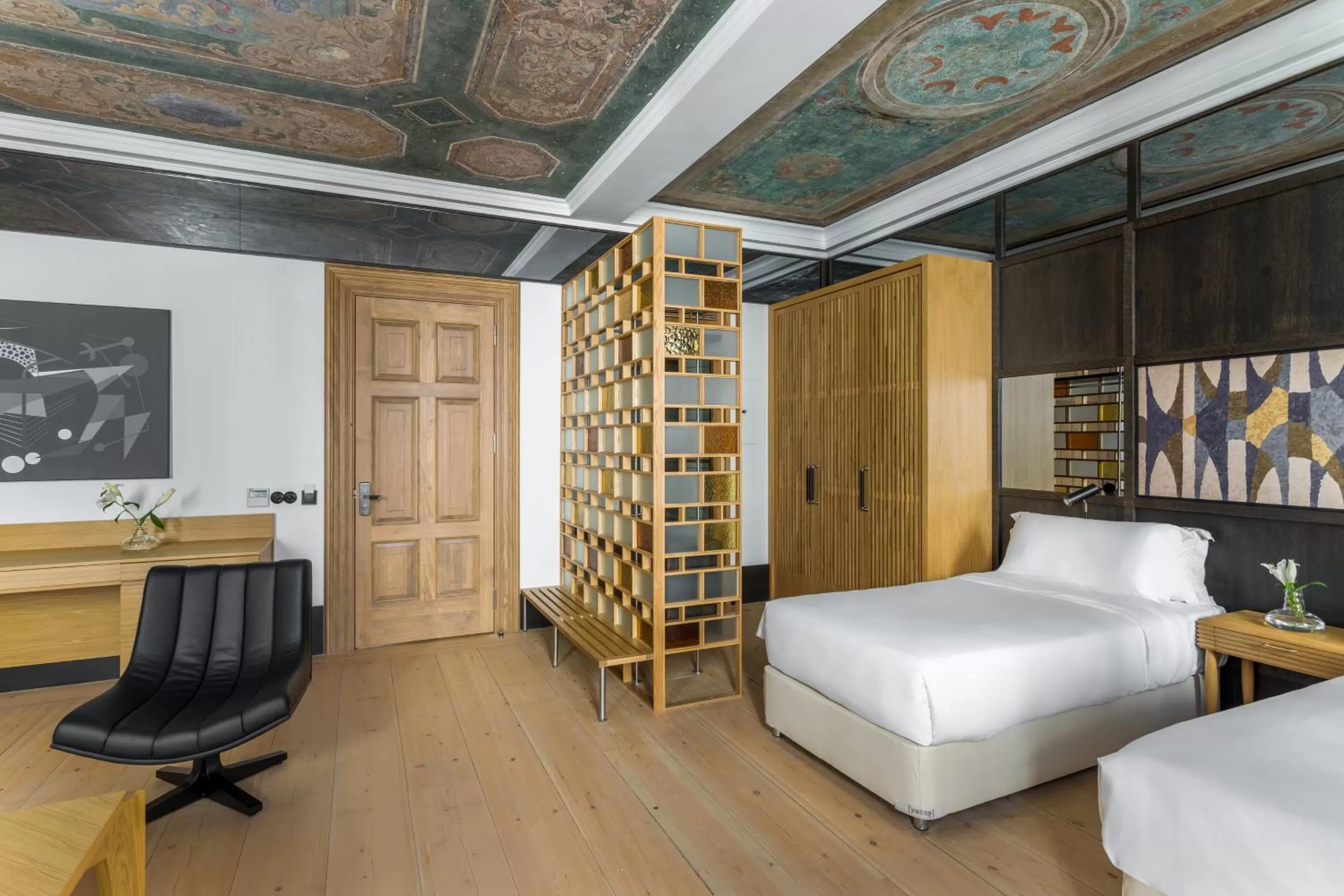 Bed in The Wings Hotels Collection