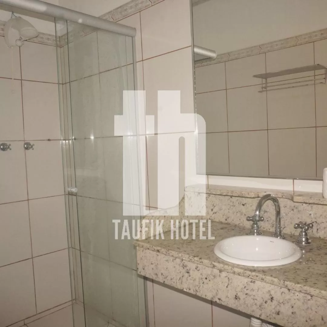 Bathroom in Taufik Hotel