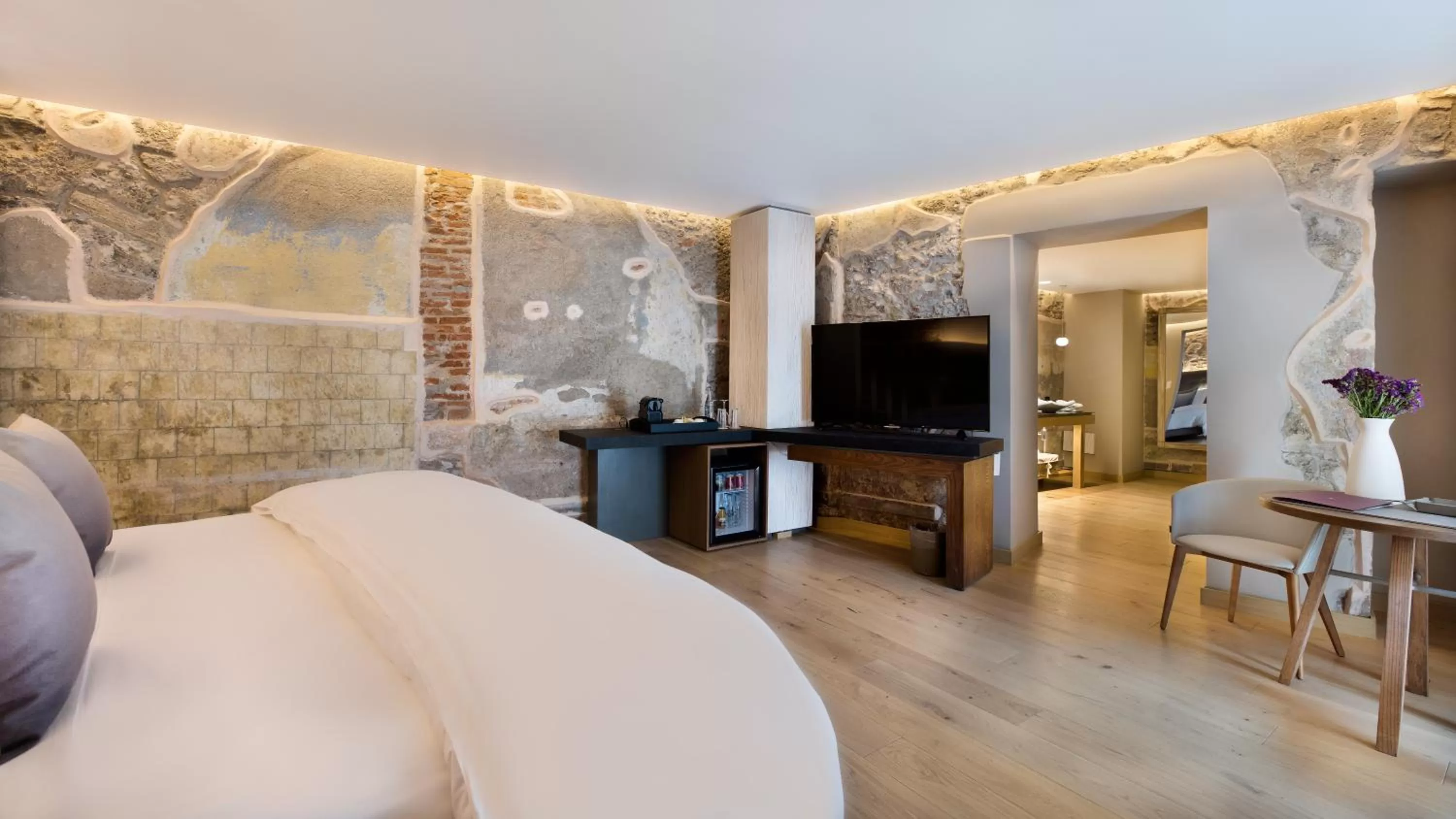 Bed in Cartesiano Boutique & Wellness Hotel