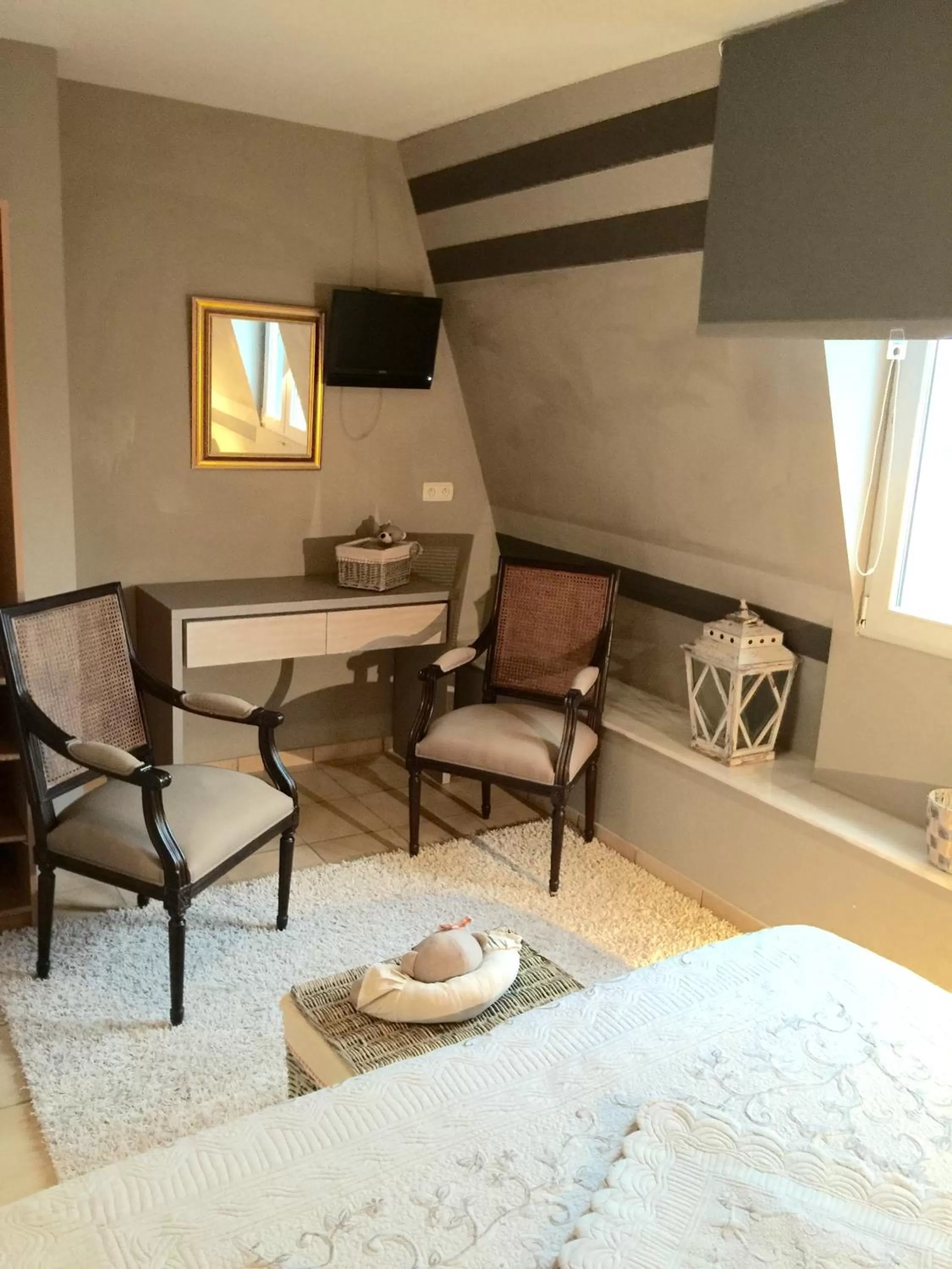 Seating area, TV/Entertainment Center in MARGOT'L