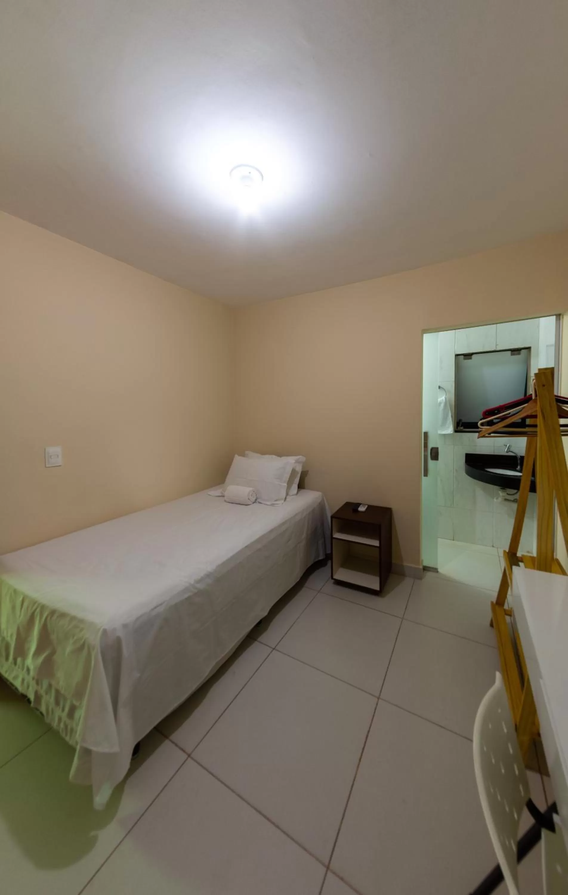 Photo of the whole room, Bed in Pousada Jardim Brasília