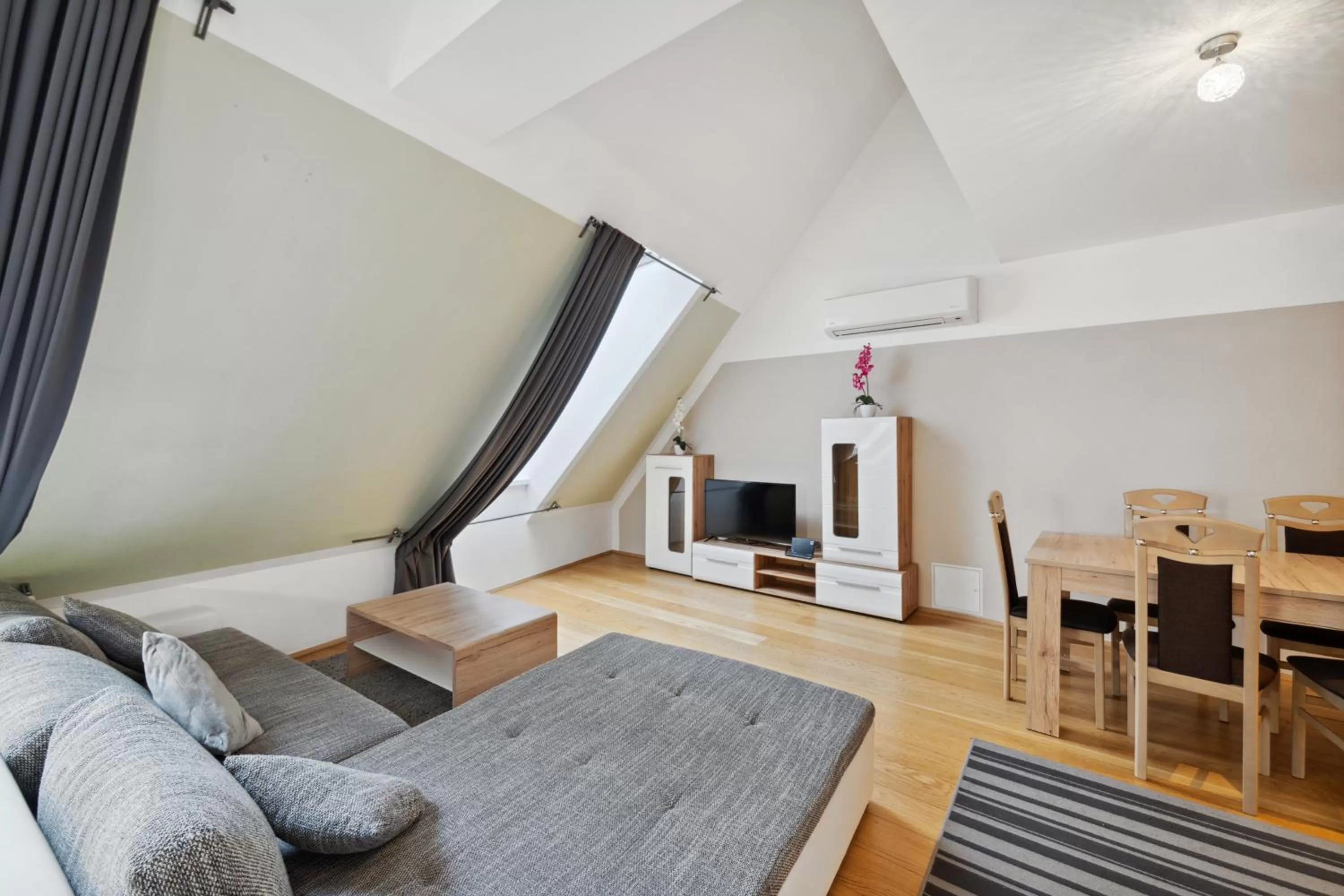 TV and multimedia, Seating Area in Florian's apartments in Mariahilf Vienna