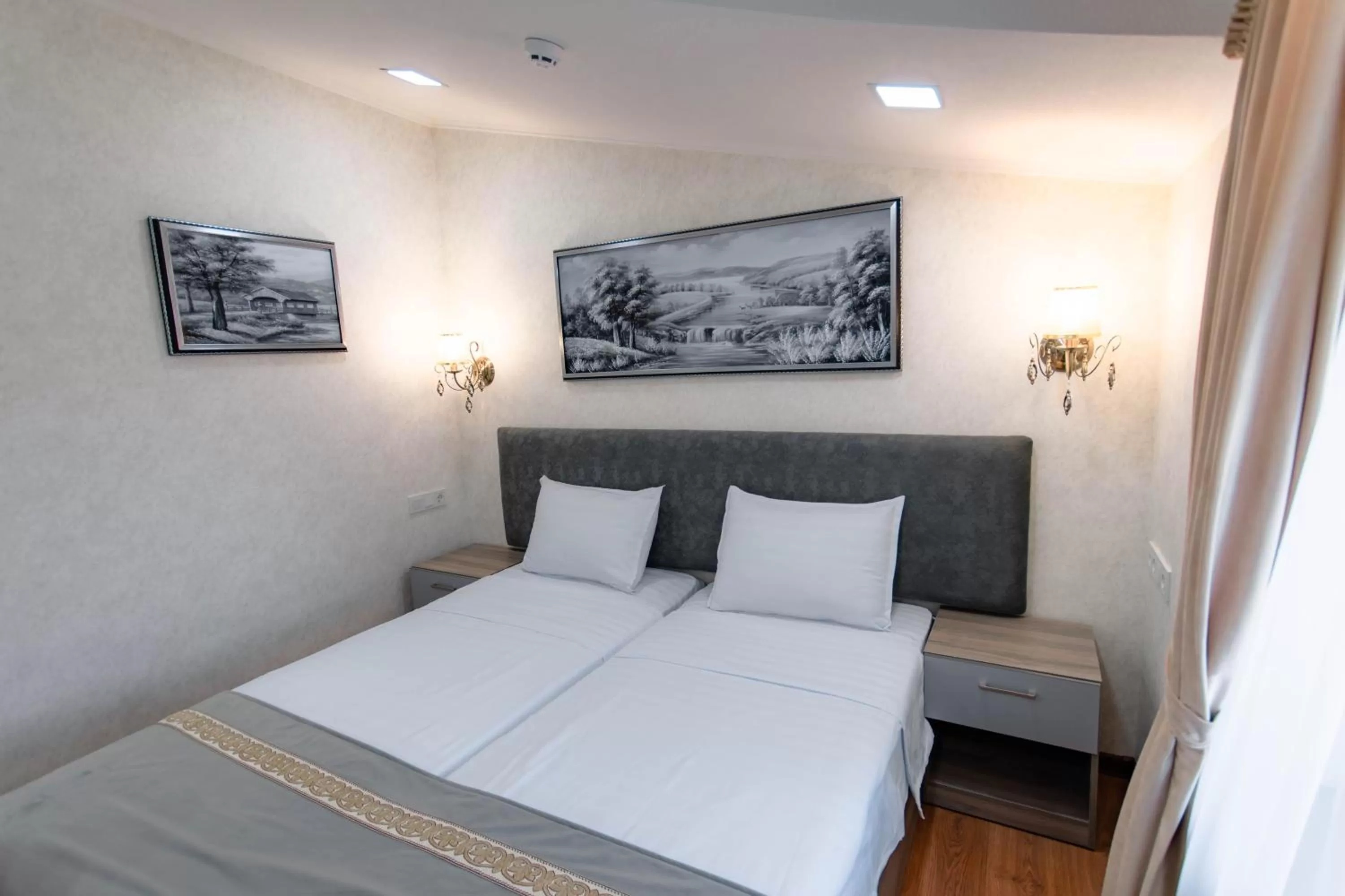 Bed in Registon Saroy Hotel