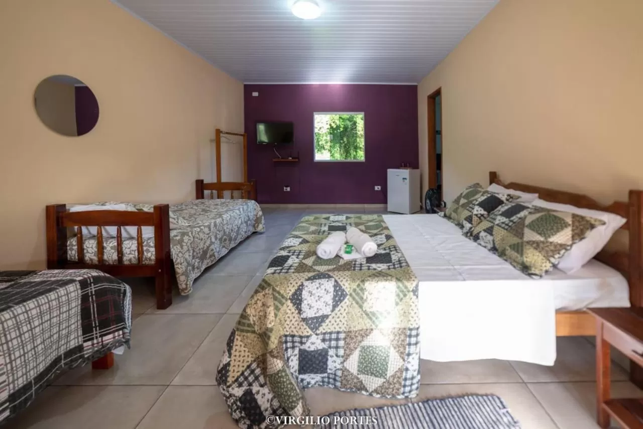 Bed in Pousada Recanto da Lu