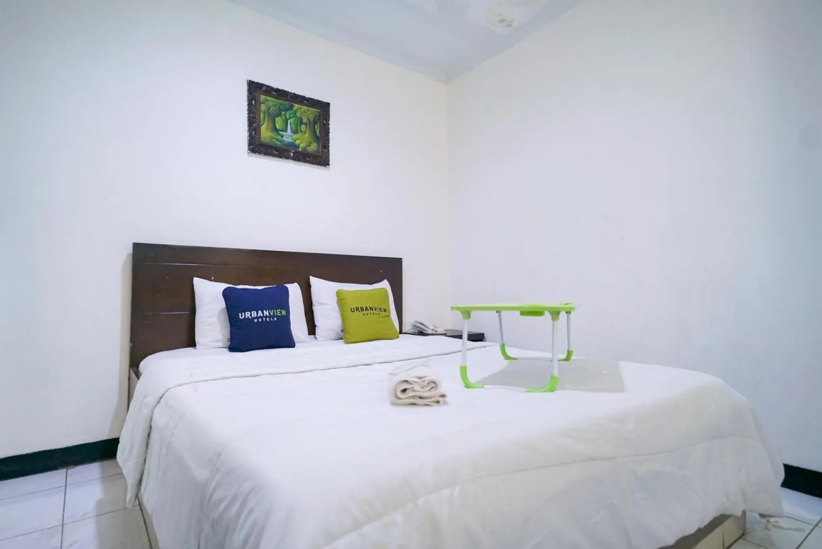 Bedroom, Bed in Urbanview Hotel Bes Mangga Besar by RedDoorz