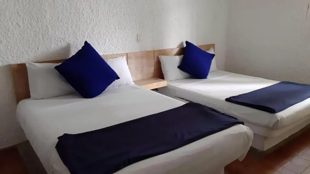 Bed in Mar Paraiso Queen