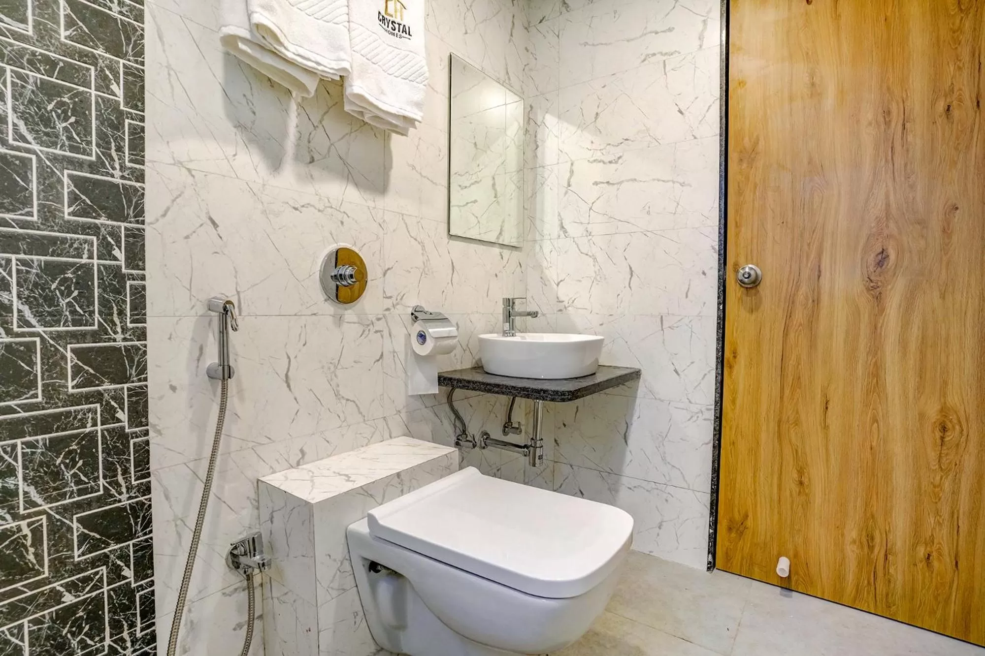 Bathroom in FabHotel Crystal Homes - nr Rajaram Bhiku stadium