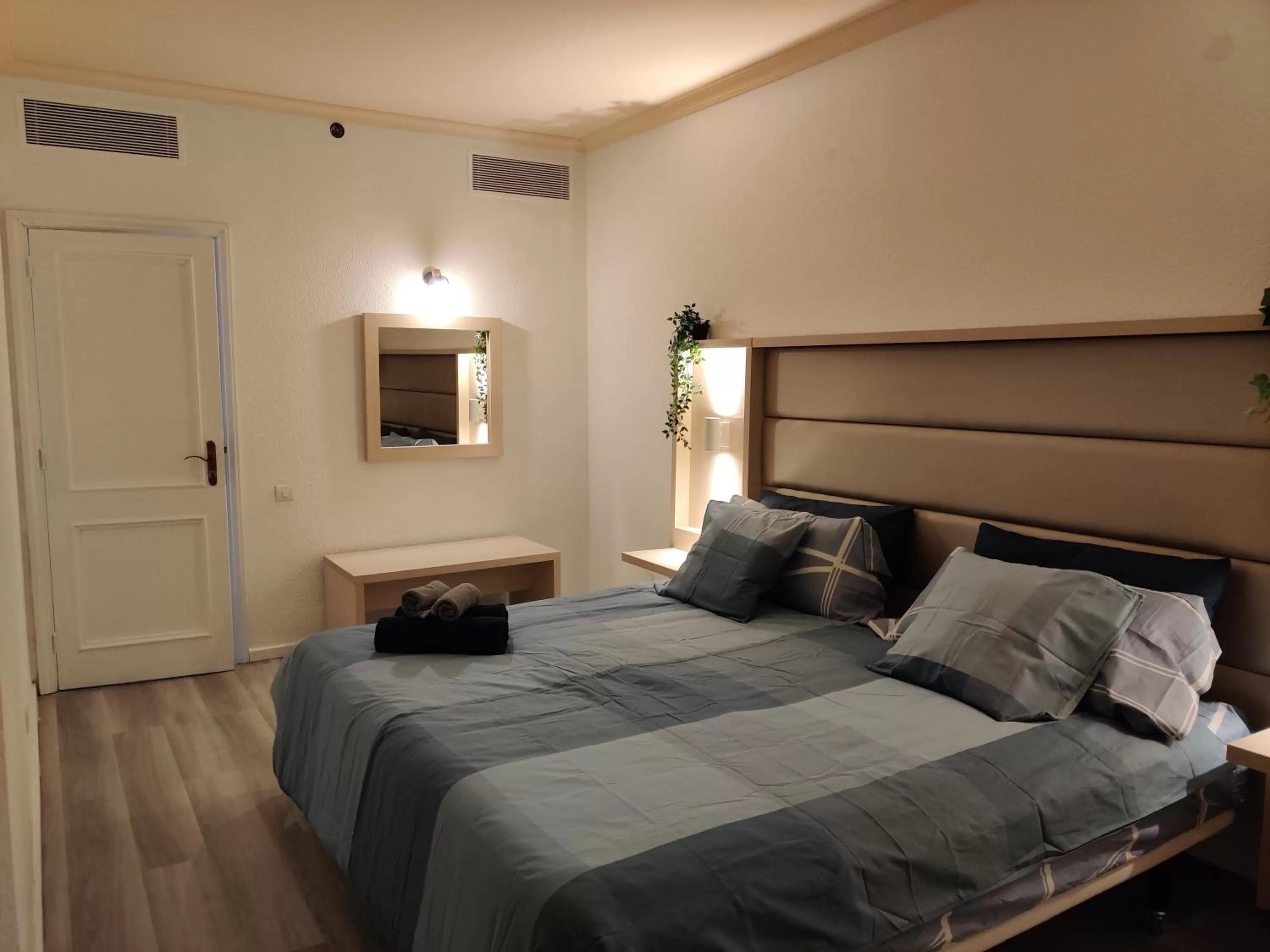 Bed in Luxury Apartment with pool view