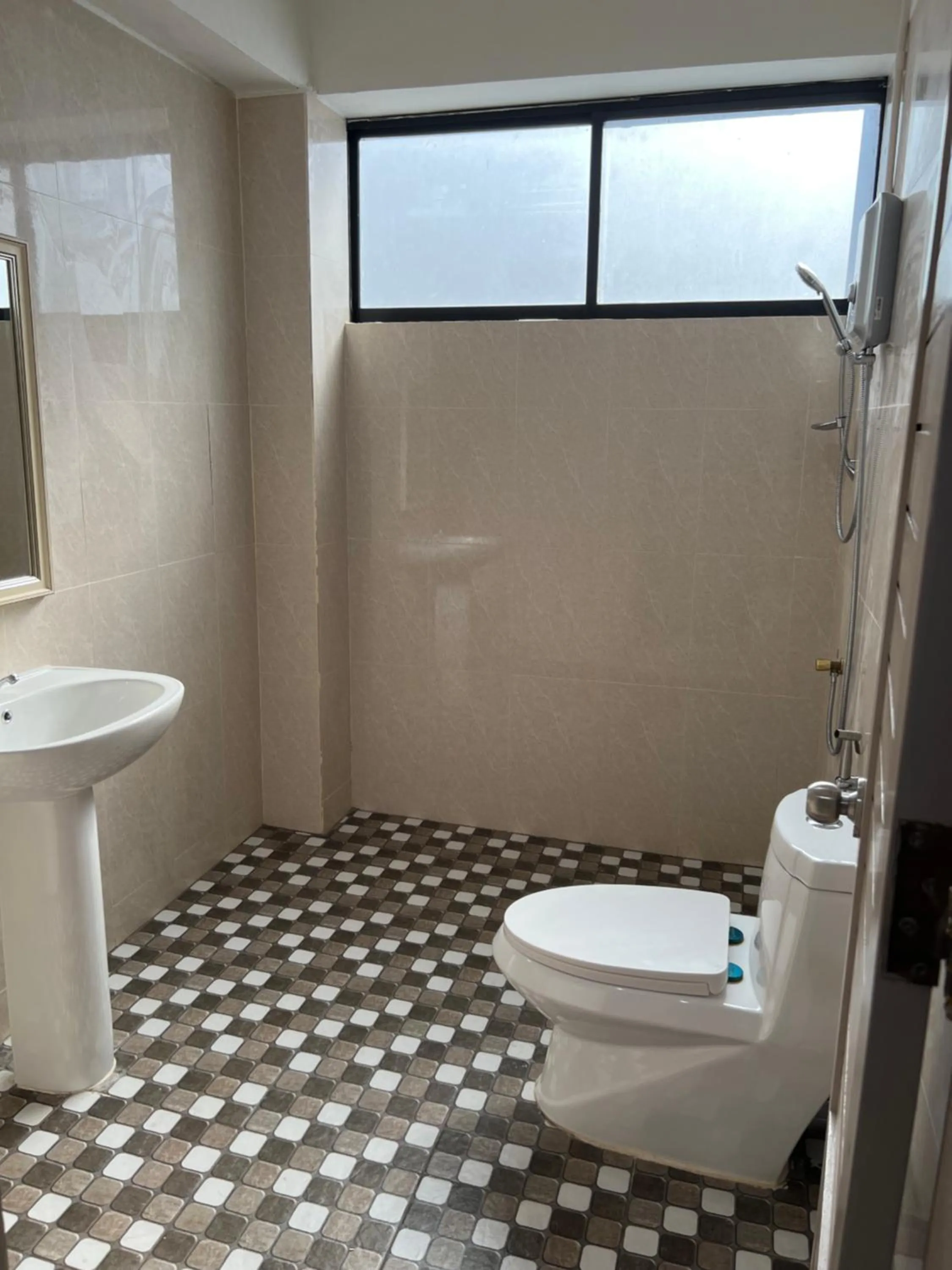 Bathroom in Mall Suites Hotel