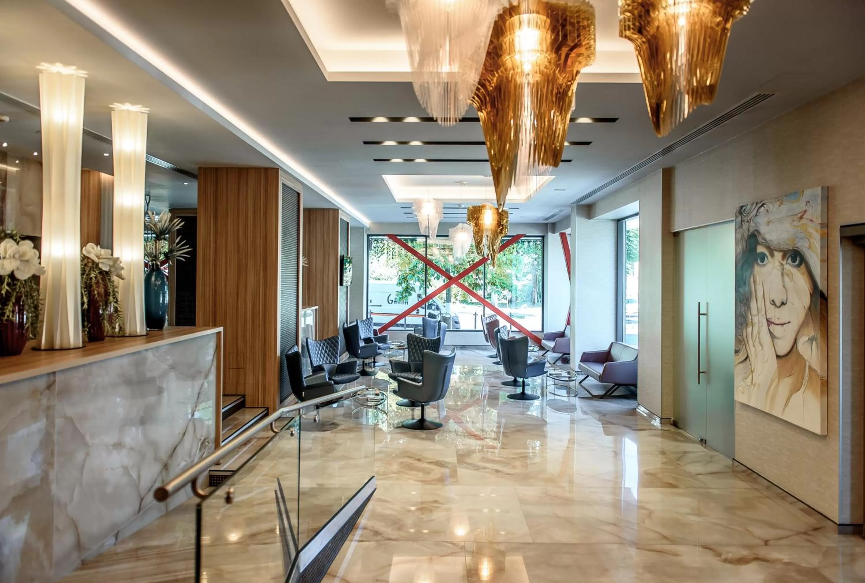Lobby or reception in Ramada by Wyndham Ramnicu Valcea