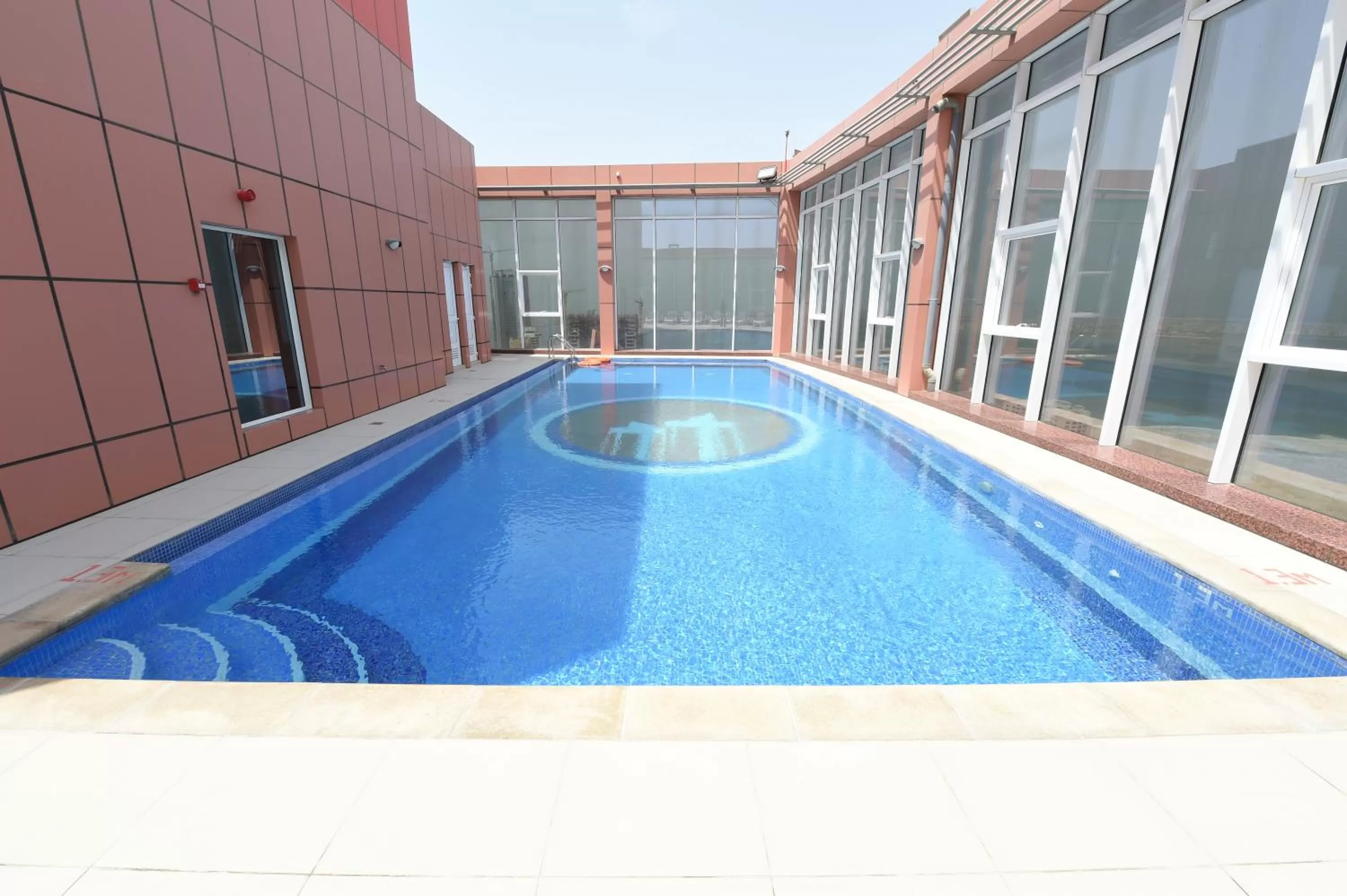 Swimming pool in Orange Suites Hotel
